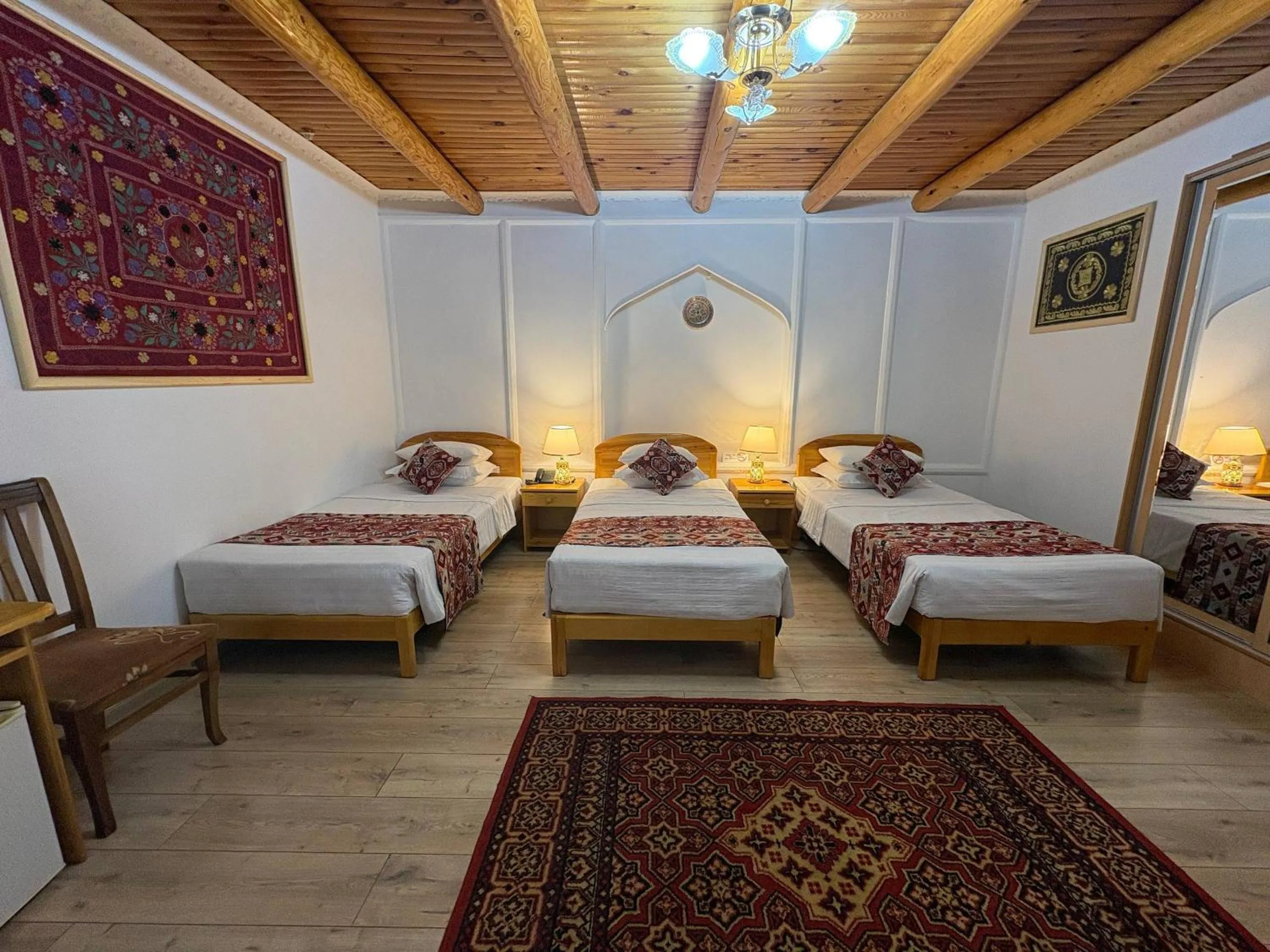 Bed in Porso Boutique Hotel