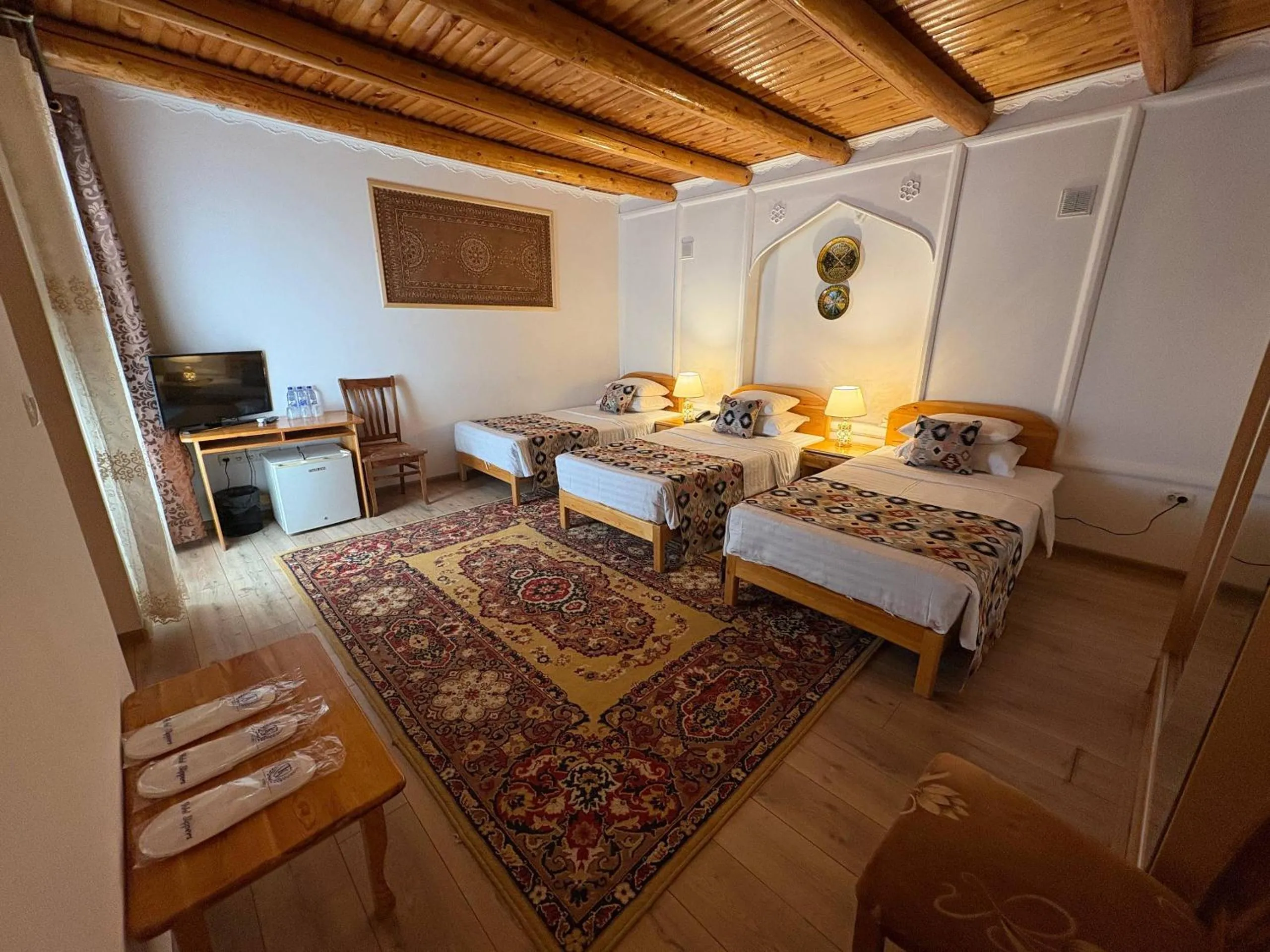 Bed in Porso Boutique Hotel