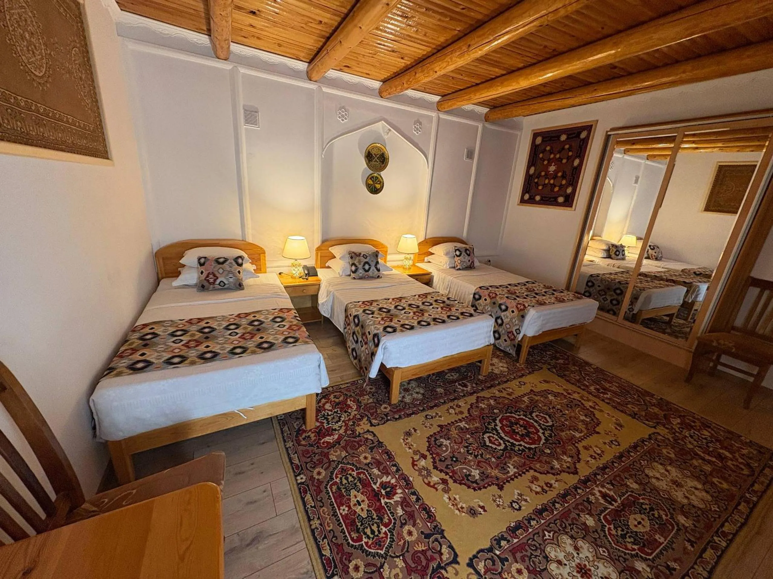 Bed in Porso Boutique Hotel