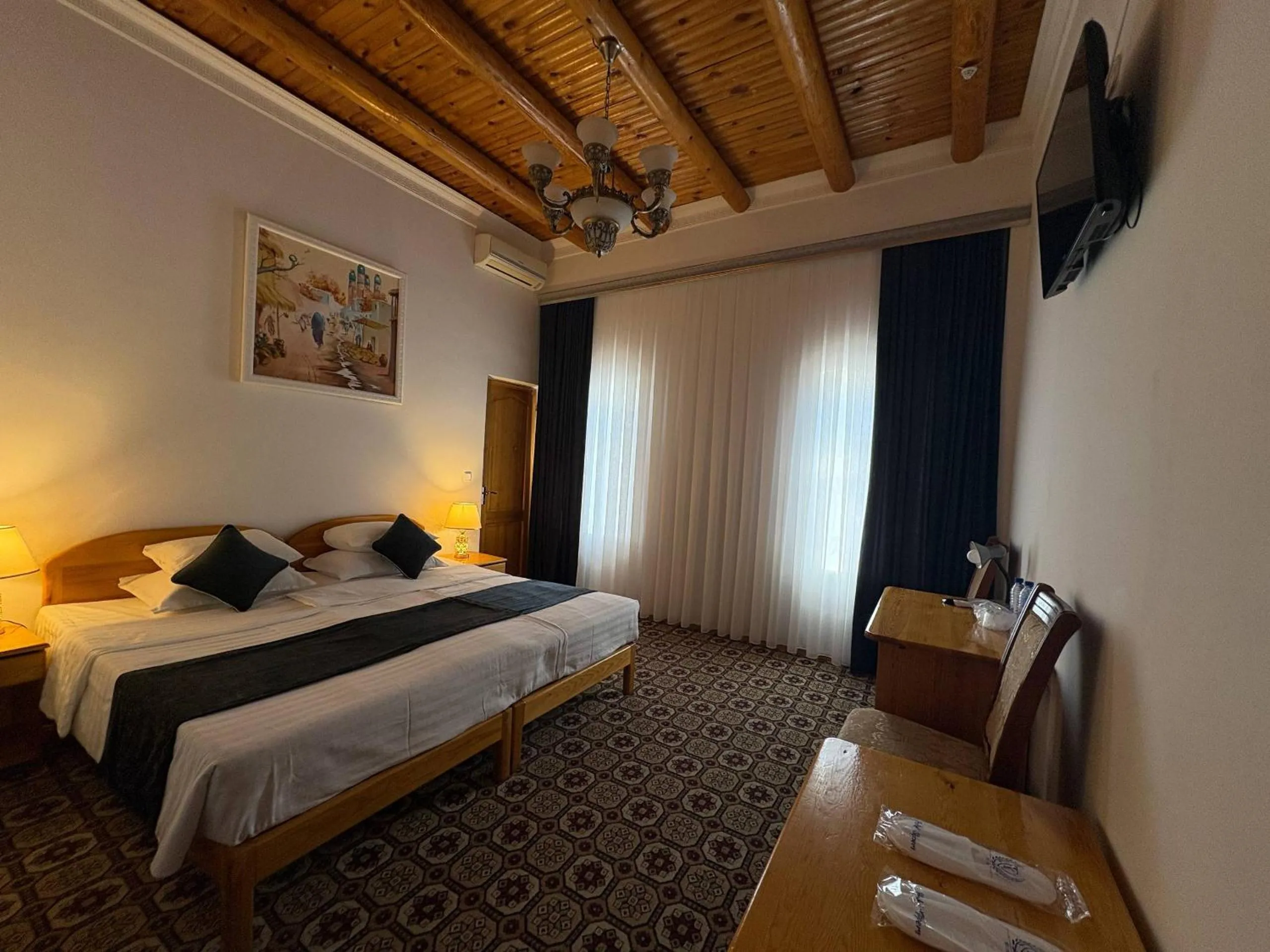 Bed in Porso Boutique Hotel