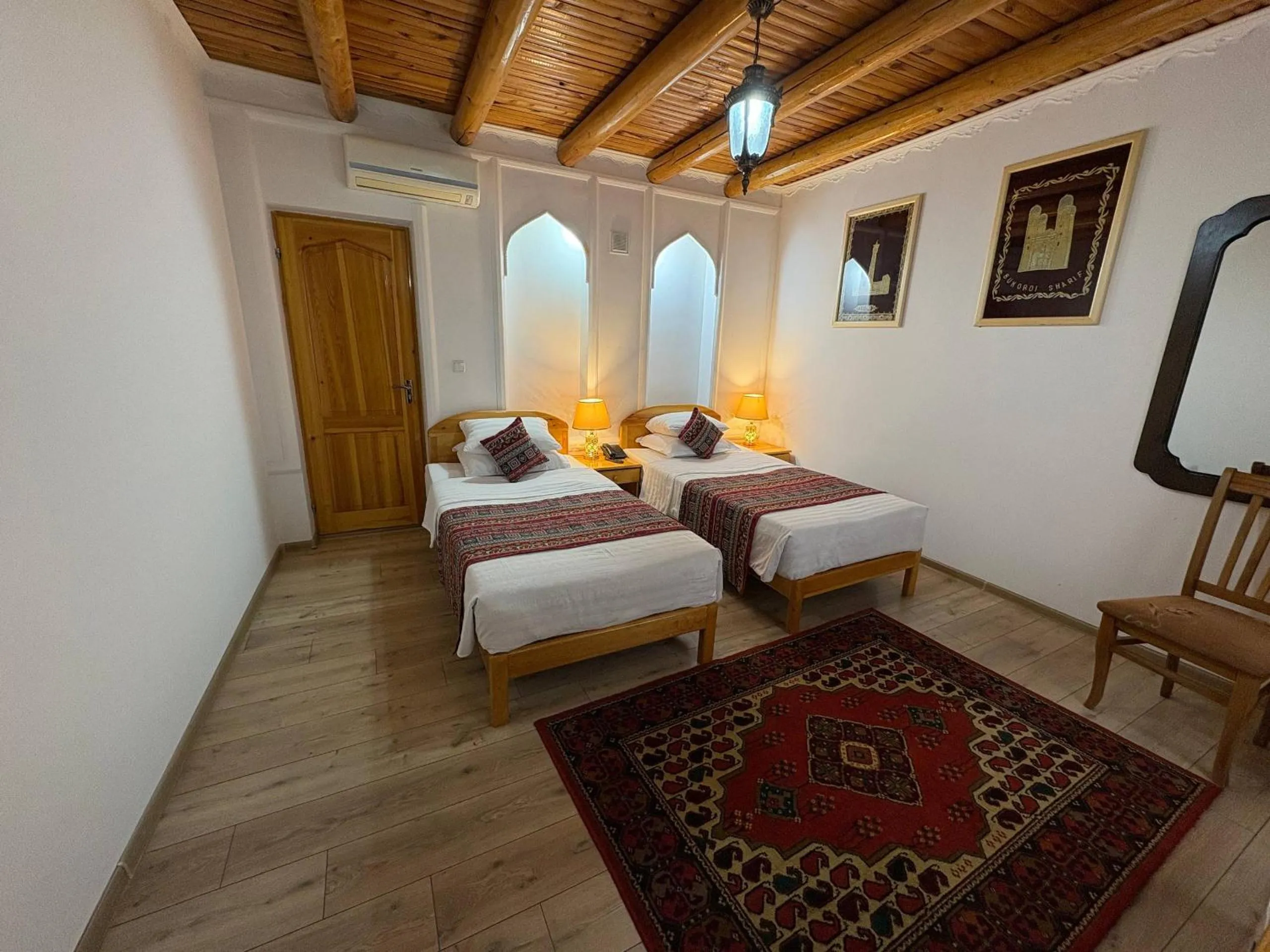 Bed in Porso Boutique Hotel