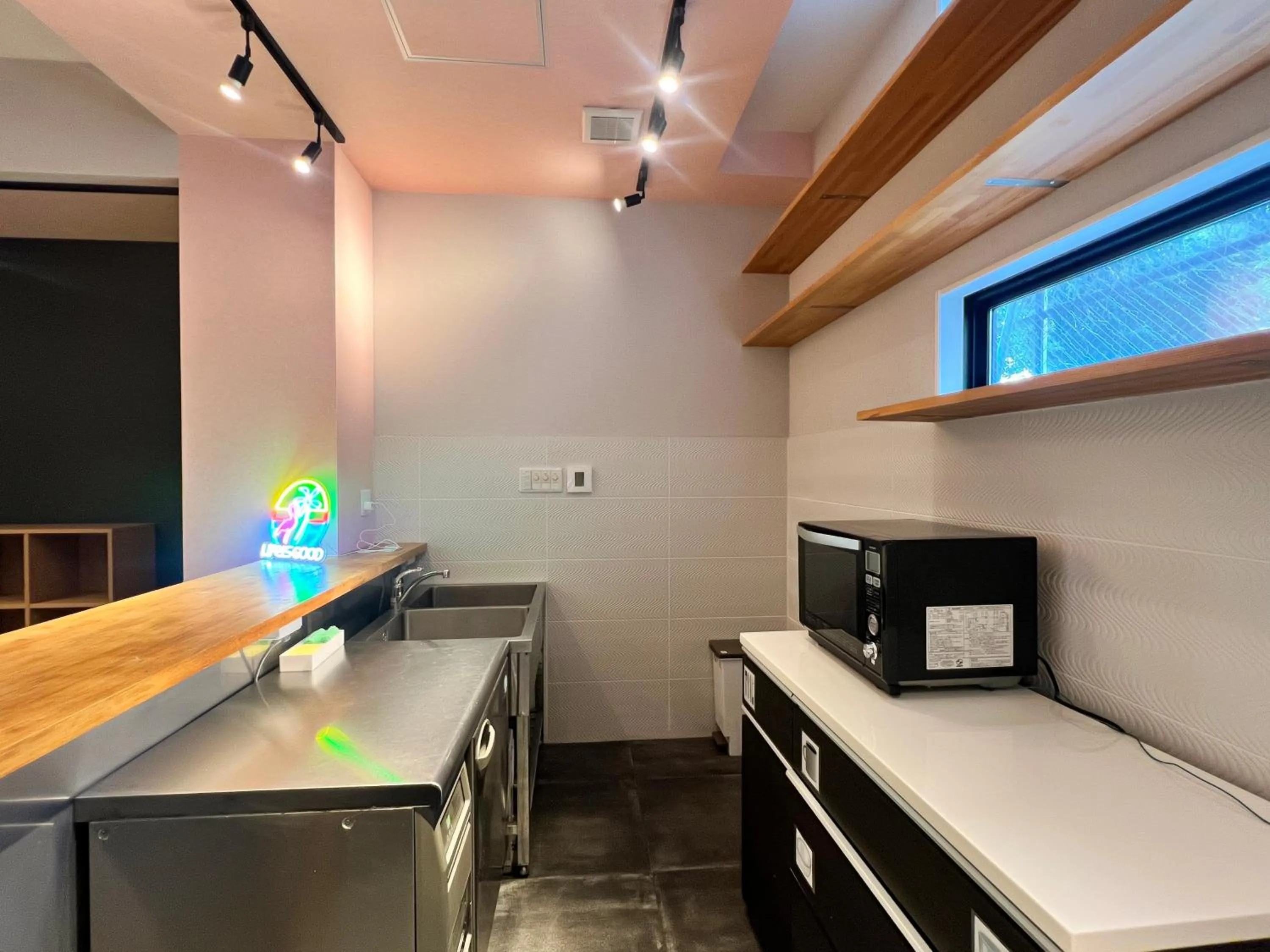 Communal kitchen in Hostel Hangout Best Value Near Kuromon Market & Namba