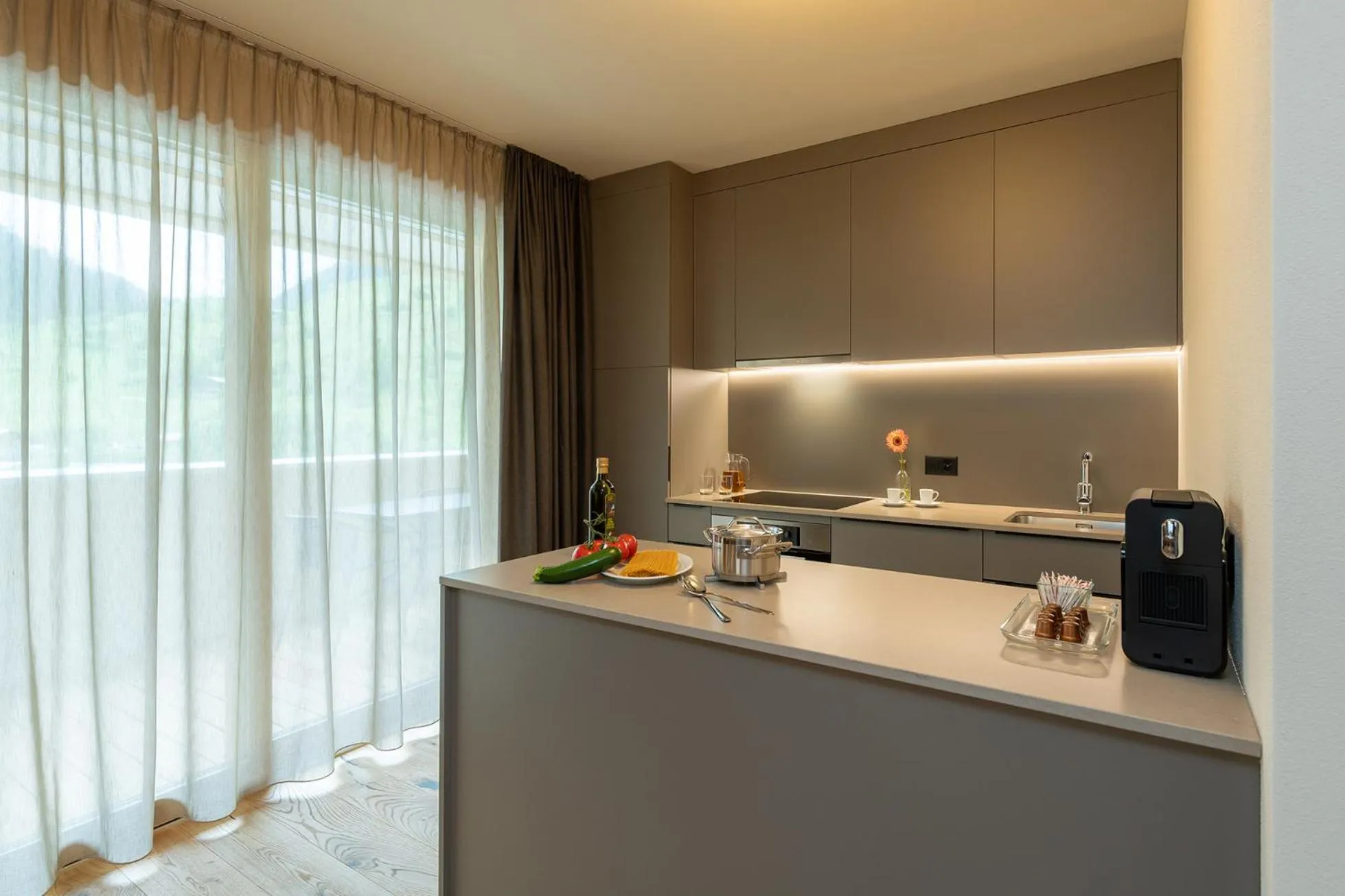 Kitchen or kitchenette in Pradas Resort Brigels