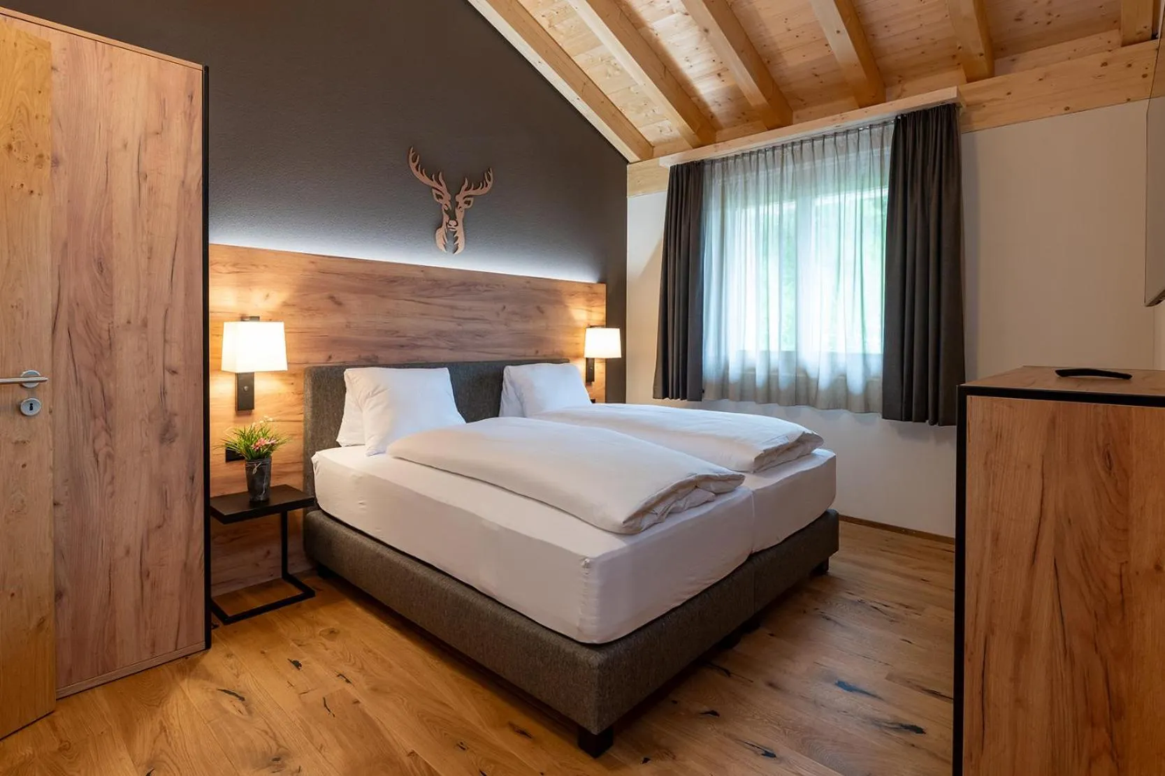 Bed in Pradas Resort Brigels