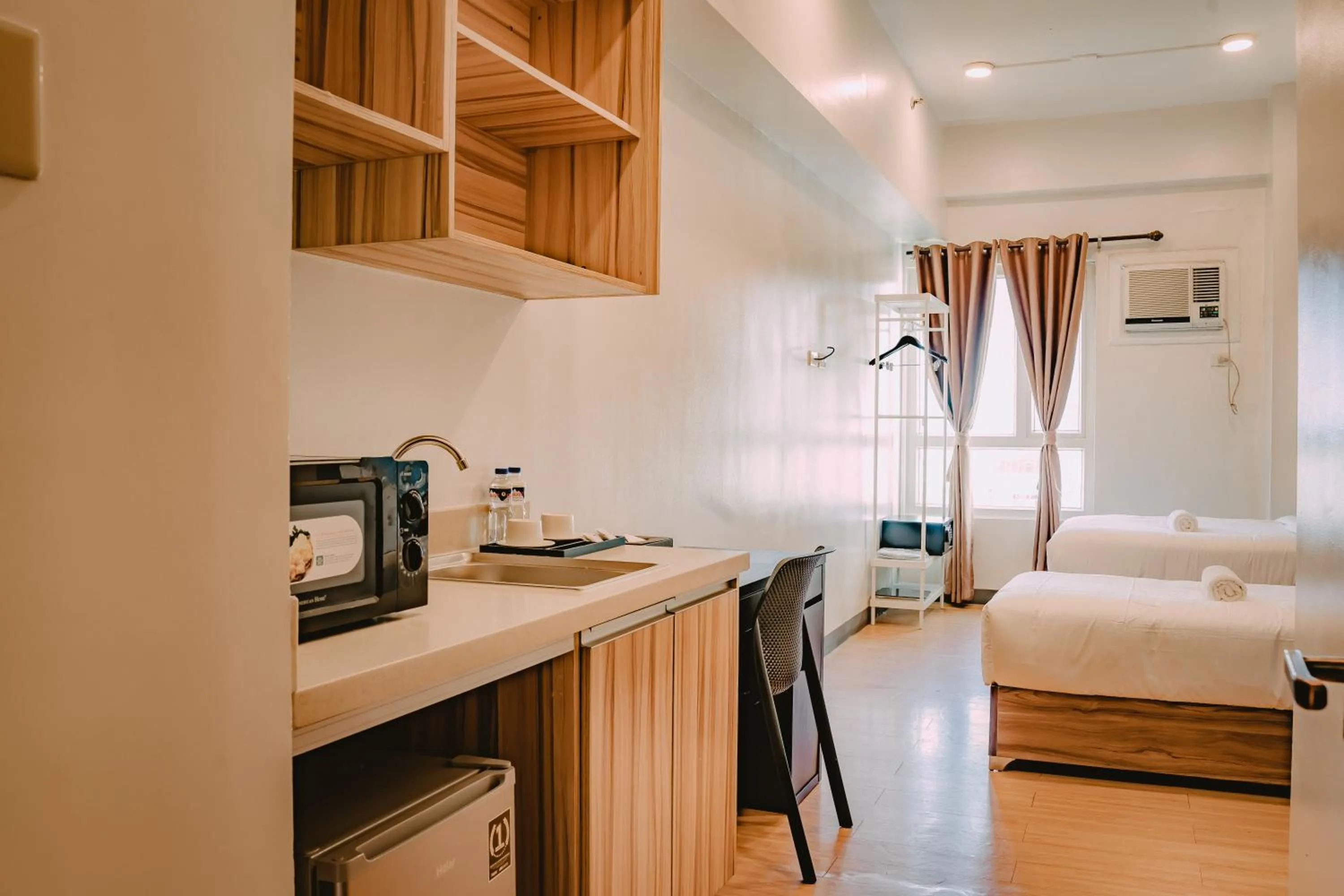 Seating area, Bed in I Suites Hotel Malate