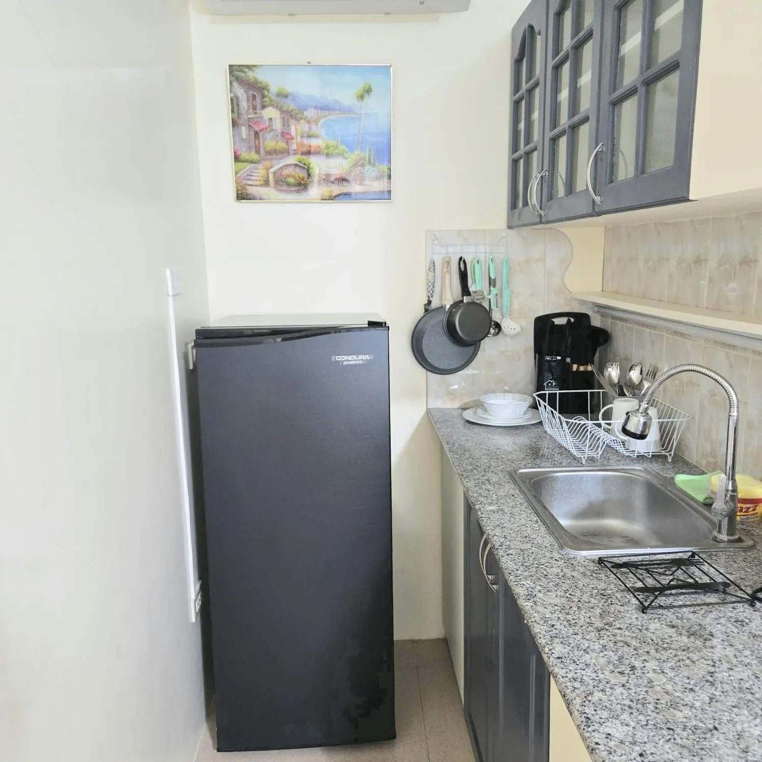 kitchen in Mangotree Apartel & Resort