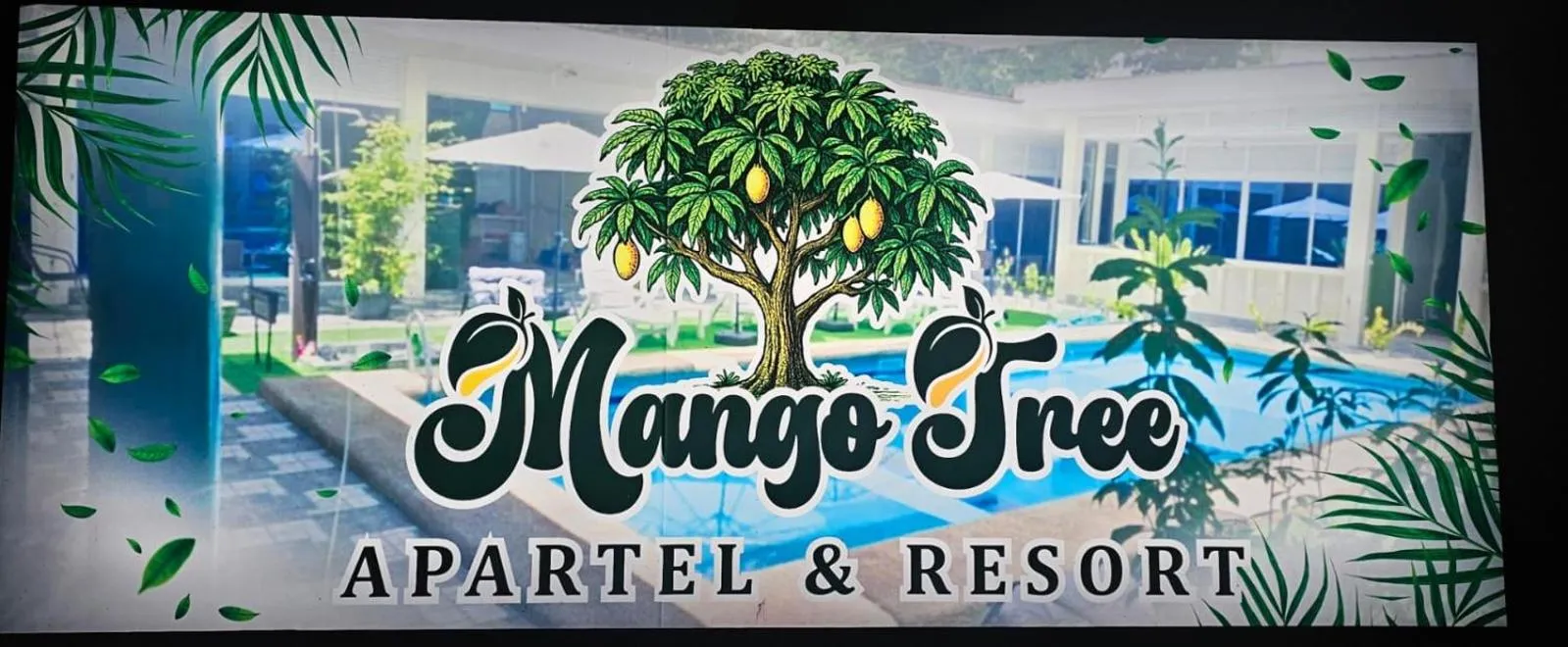 Property logo or sign in Mangotree Apartel & Resort