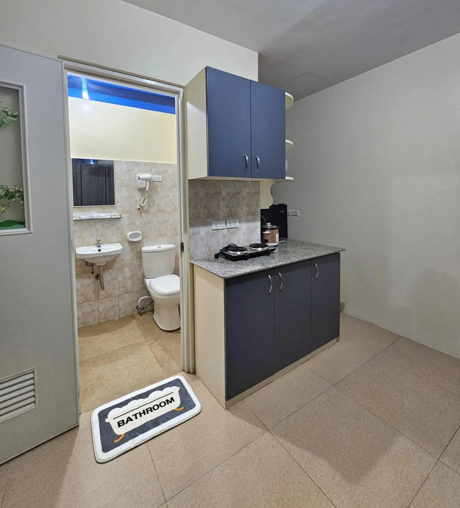 kitchen in Mangotree Apartel & Resort