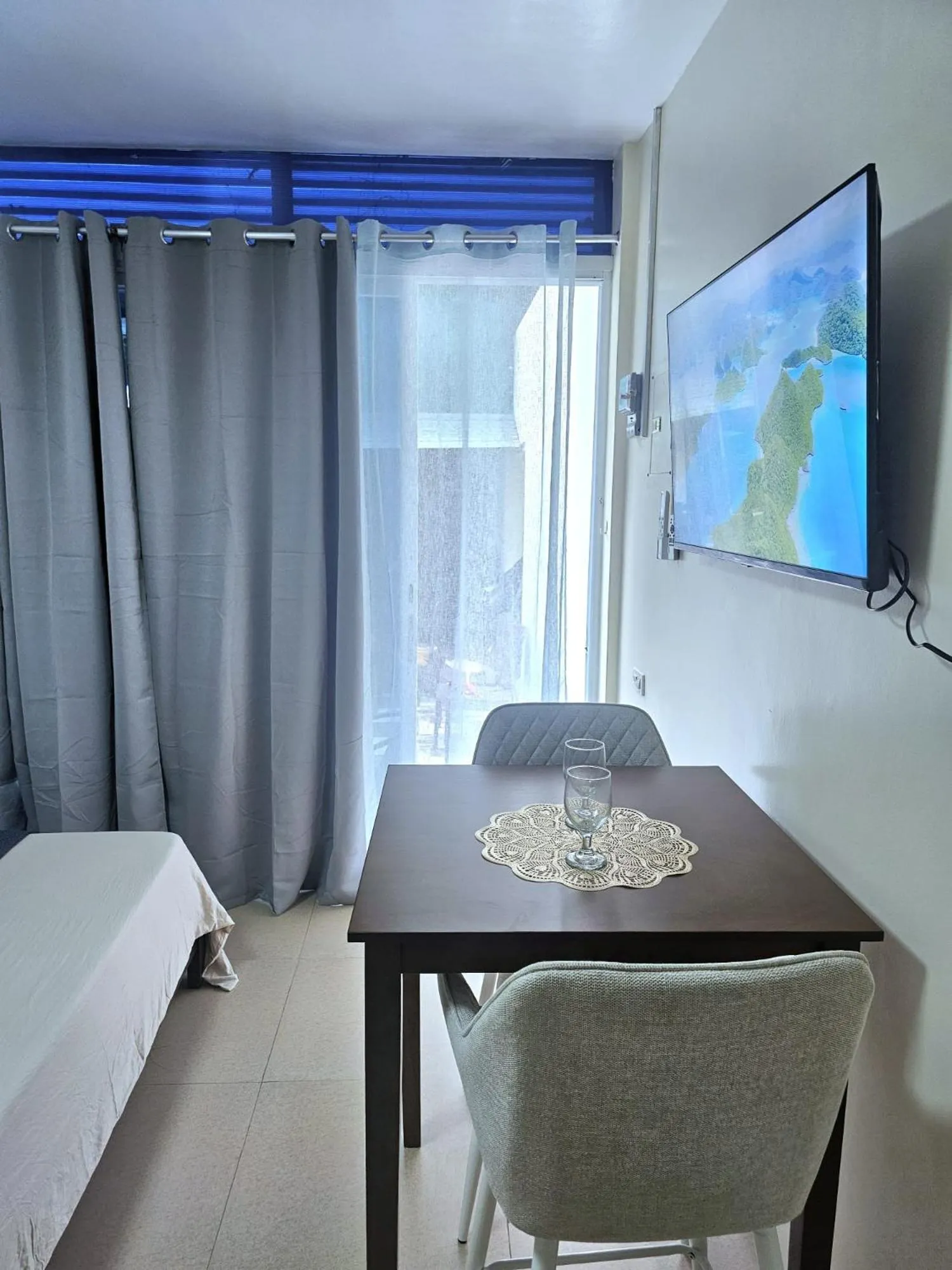 TV and multimedia, Bed in Mangotree Apartel & Resort