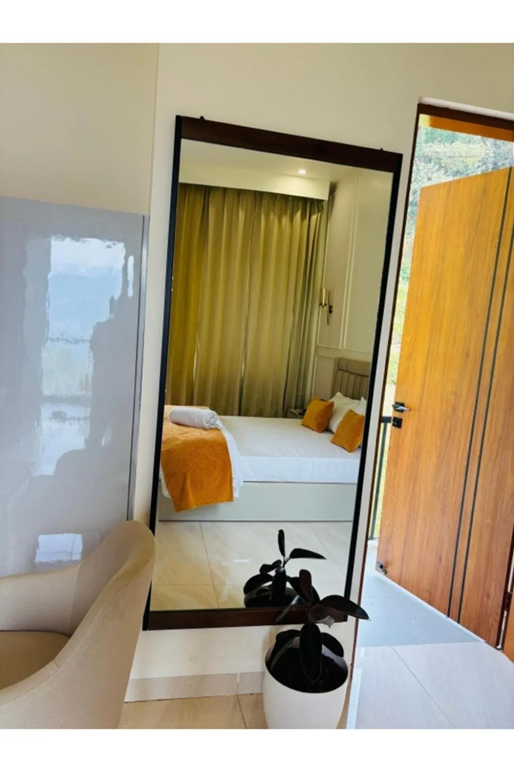 Bed in Yashasvi Himalayan Resort