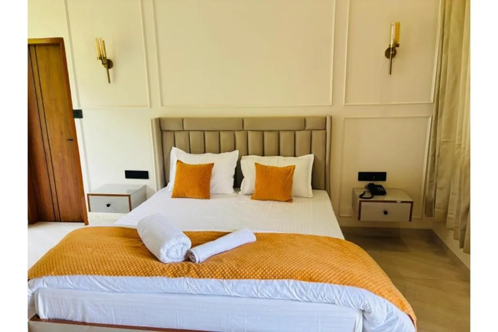 Bed in Yashasvi Himalayan Resort