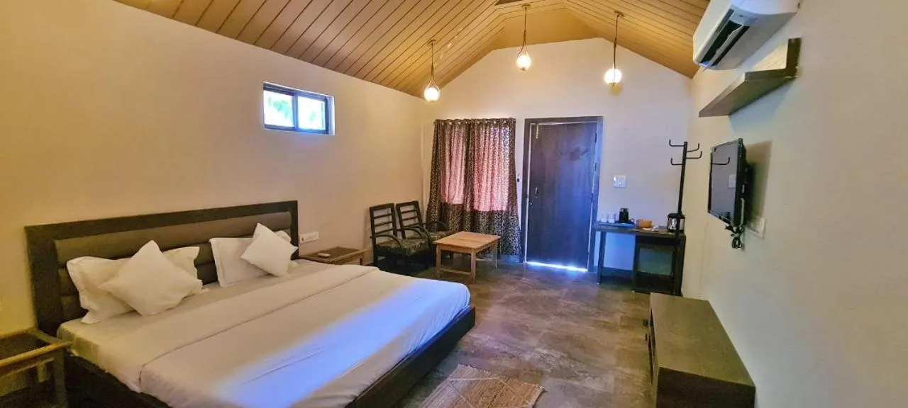 Bed in Greenscape Resort Satpura