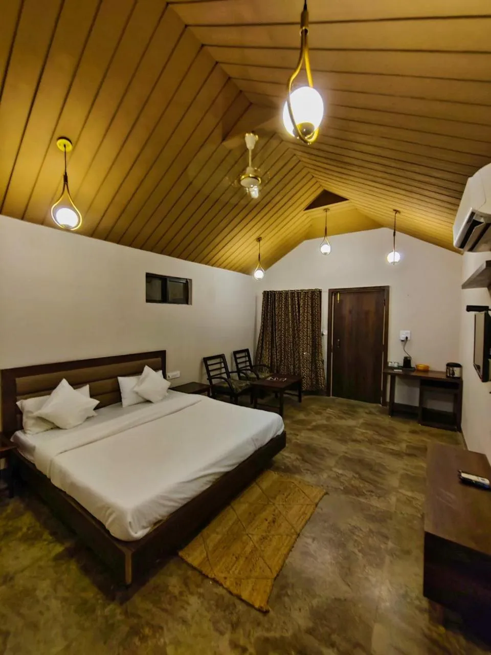 Bed in Greenscape Resort Satpura