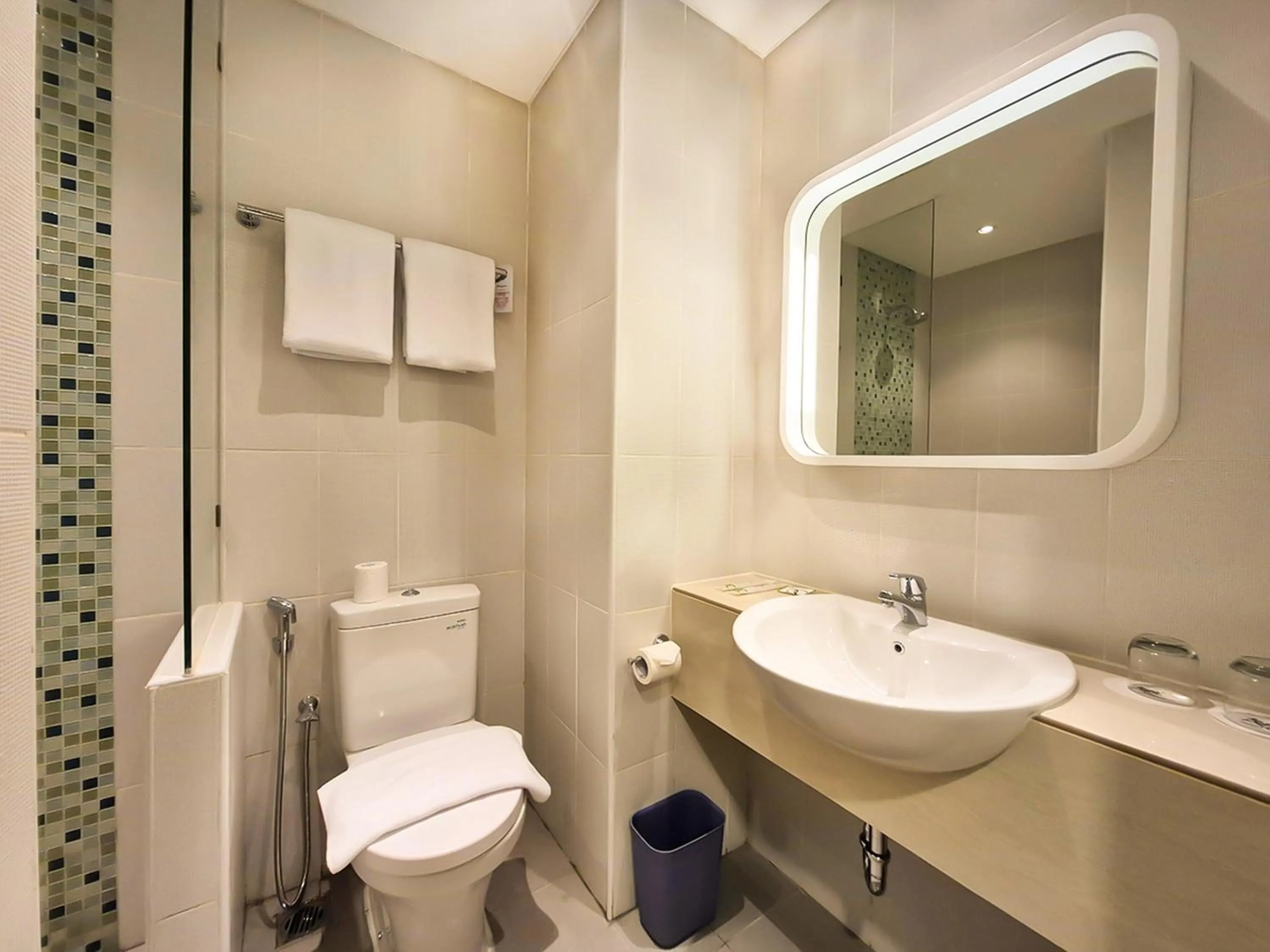 Bathroom in Zest Ambon by Swiss-Belhotel International