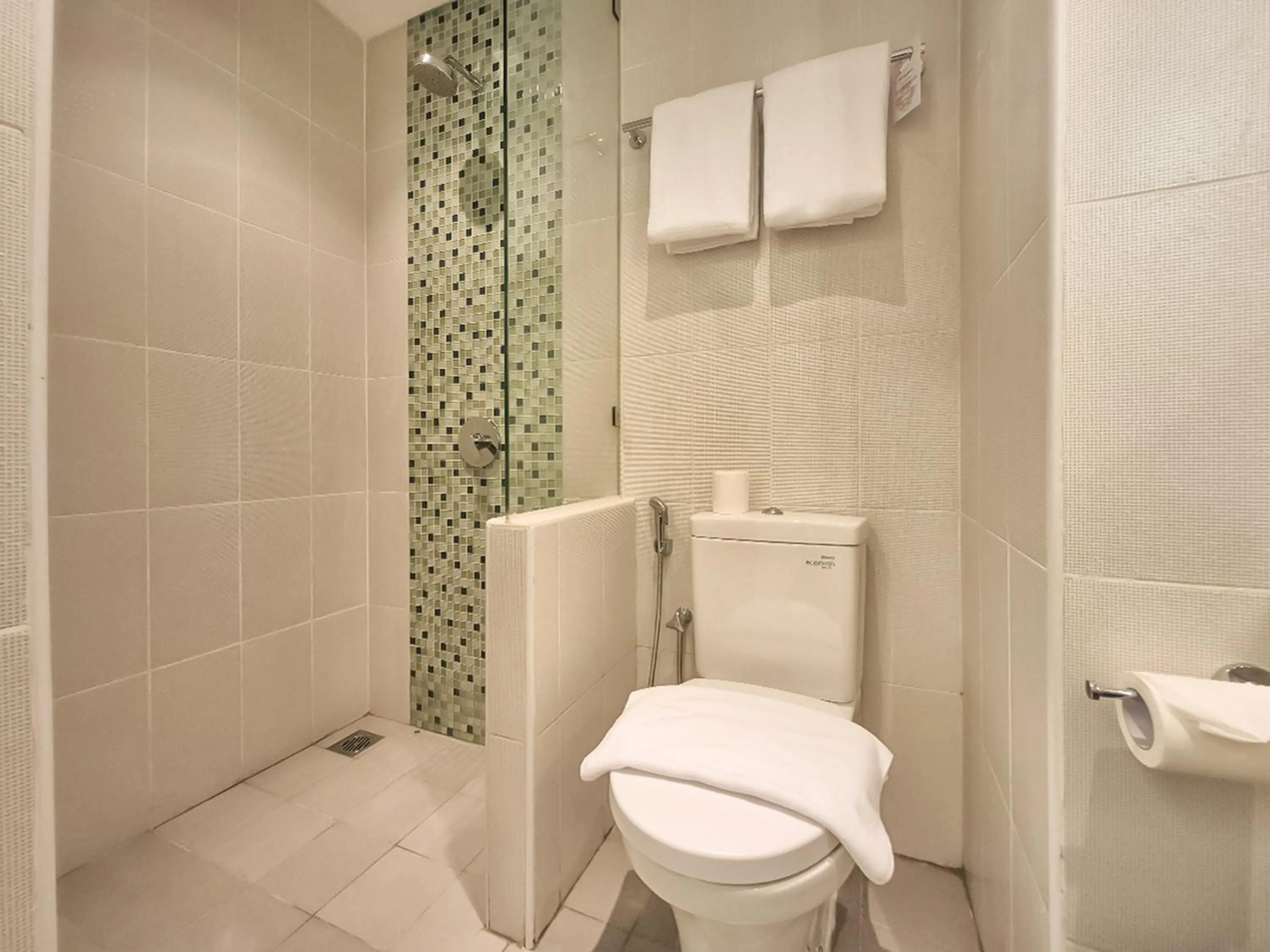 Bathroom in Zest Ambon by Swiss-Belhotel International