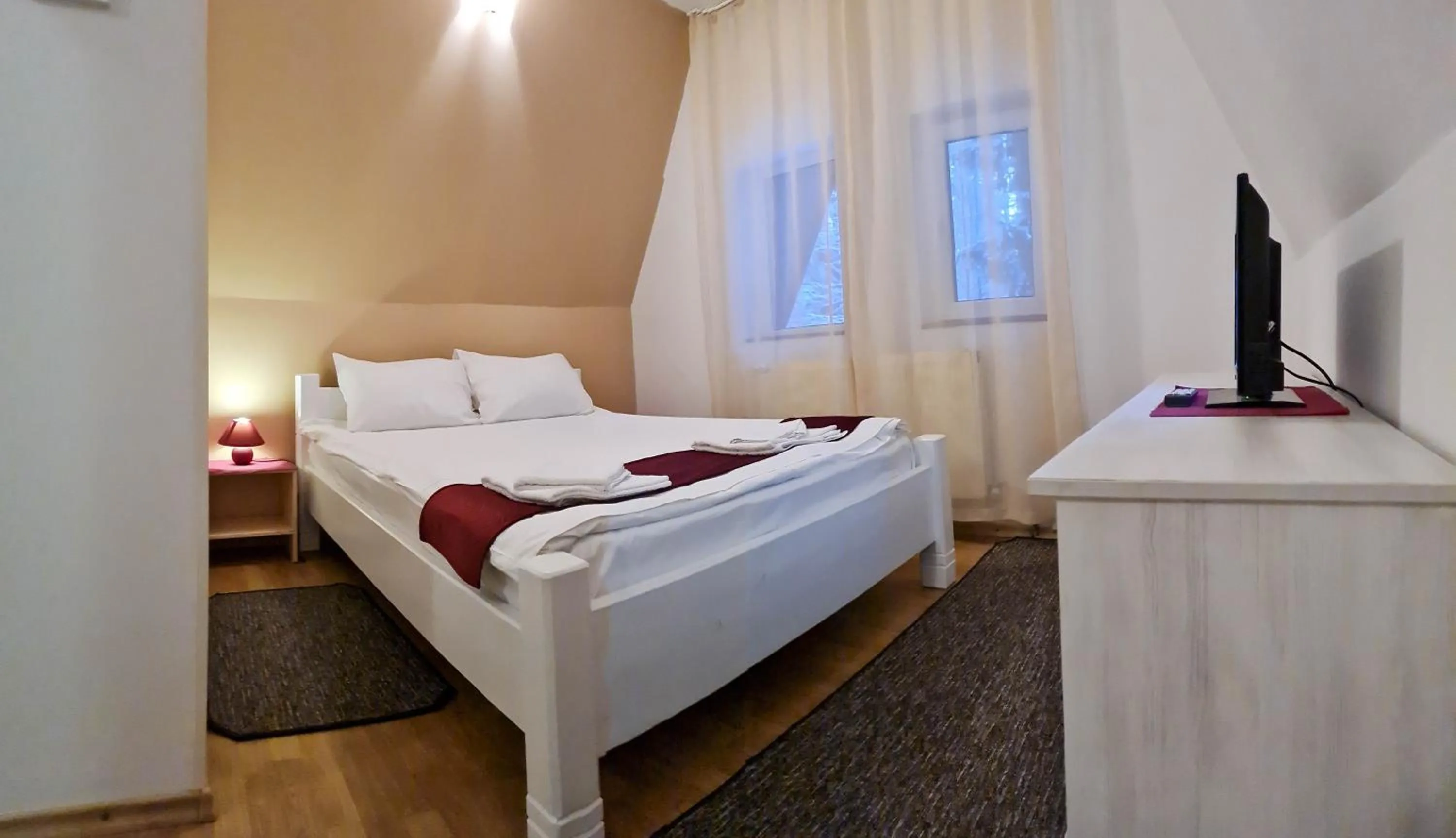 Bed in Pensiunea Happy Inn