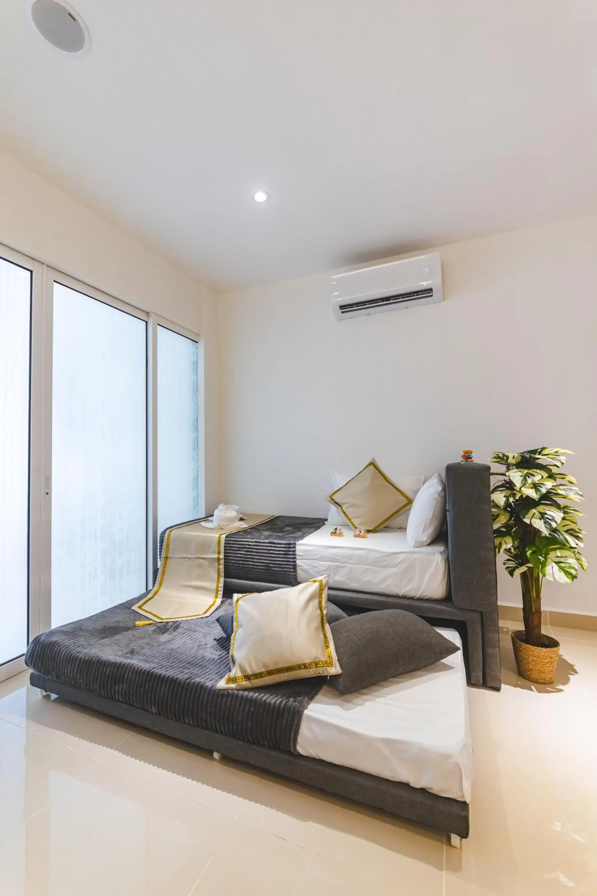 Bed in 5StarPanda Seaview Suites at The Shore Kota Kinabalu