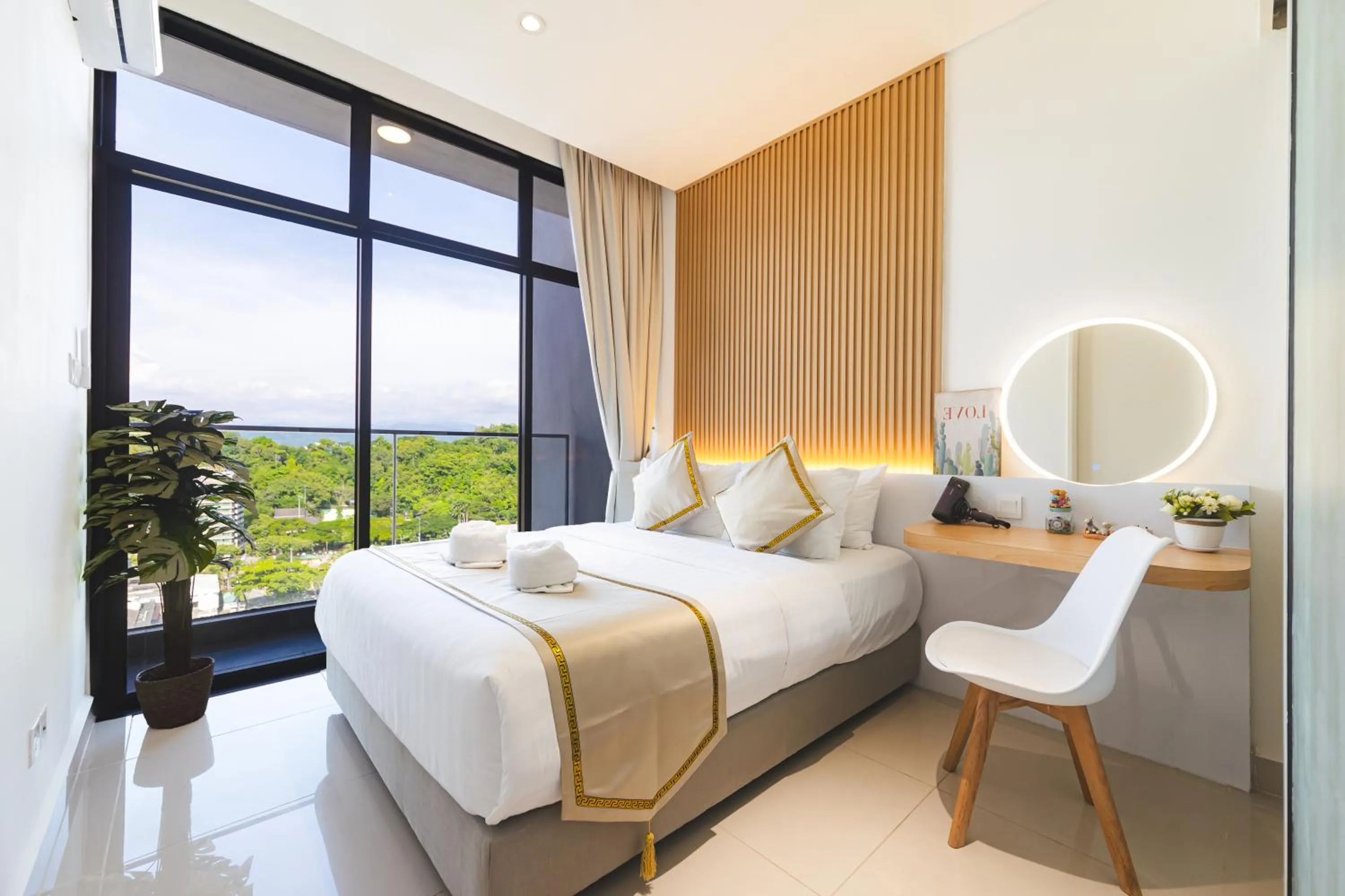 Bed in 5StarPanda Seaview Suites at The Shore Kota Kinabalu