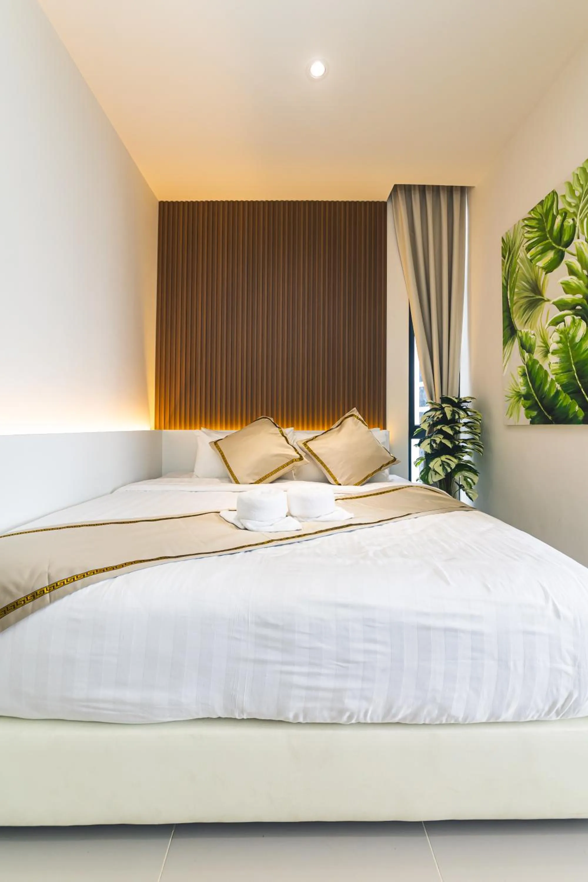 Bed in 5StarPanda Seaview Suites at The Shore Kota Kinabalu