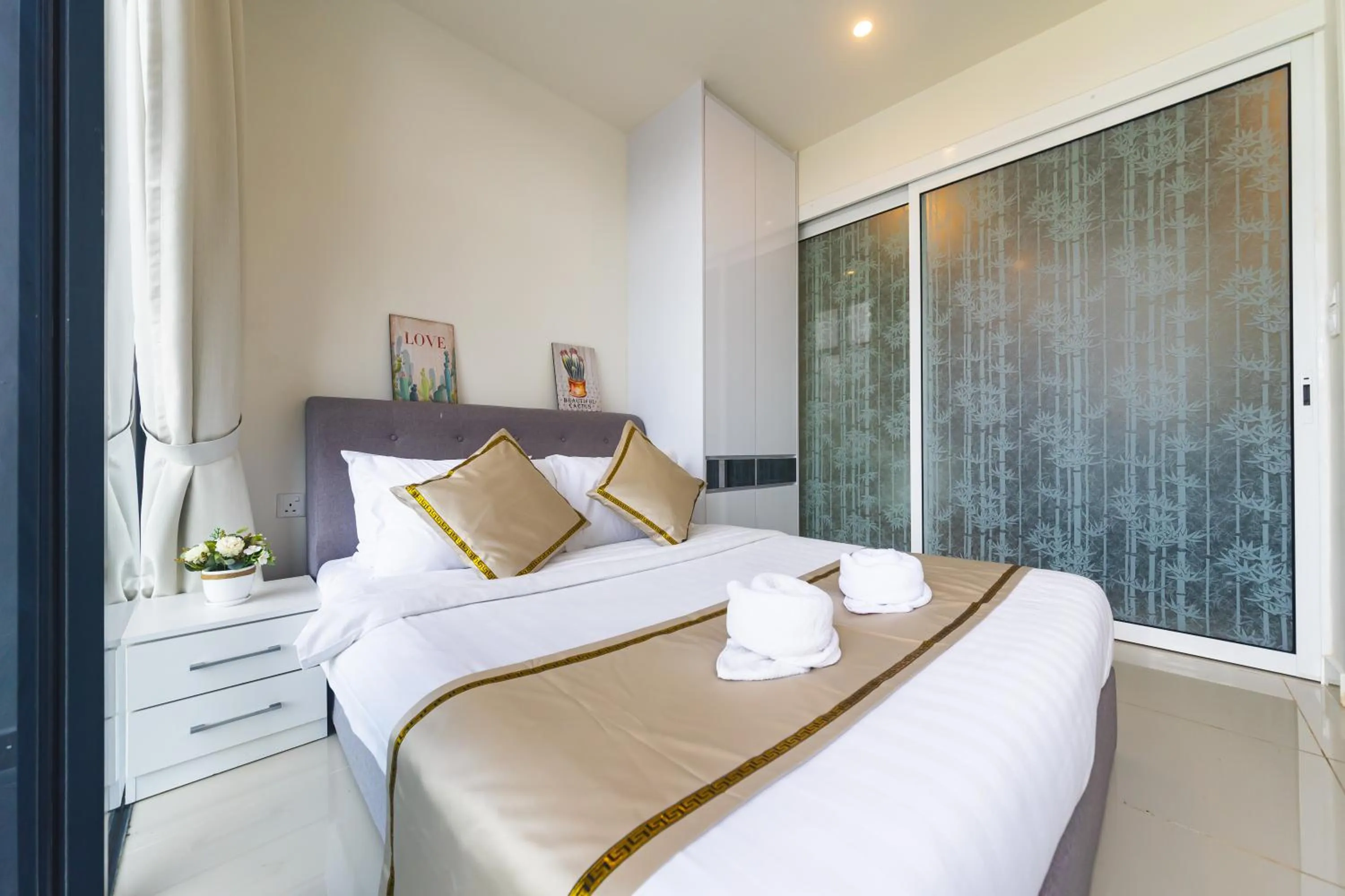 Bed in 5StarPanda Seaview Suites at The Shore Kota Kinabalu
