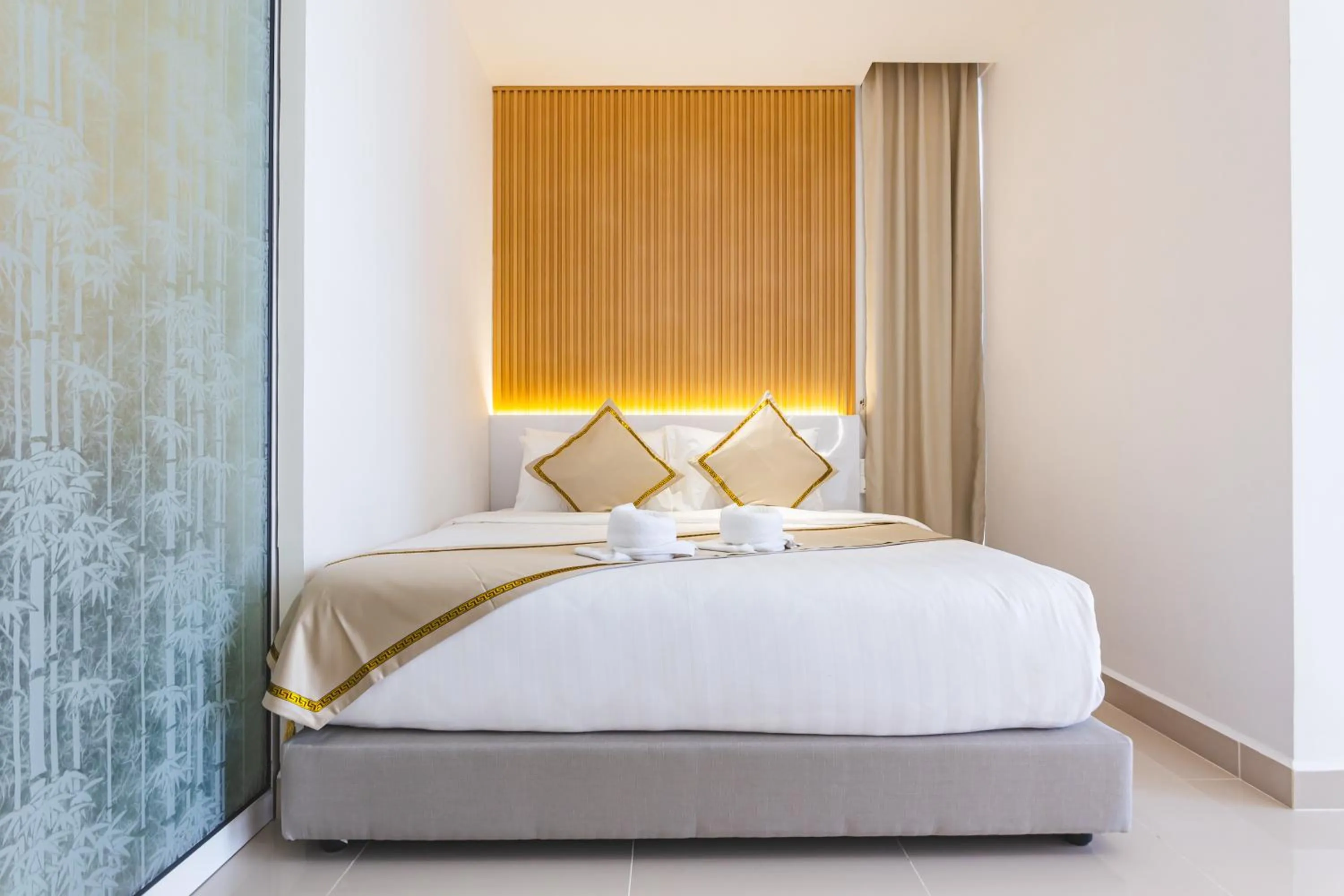 Bed in 5StarPanda Seaview Suites at The Shore Kota Kinabalu