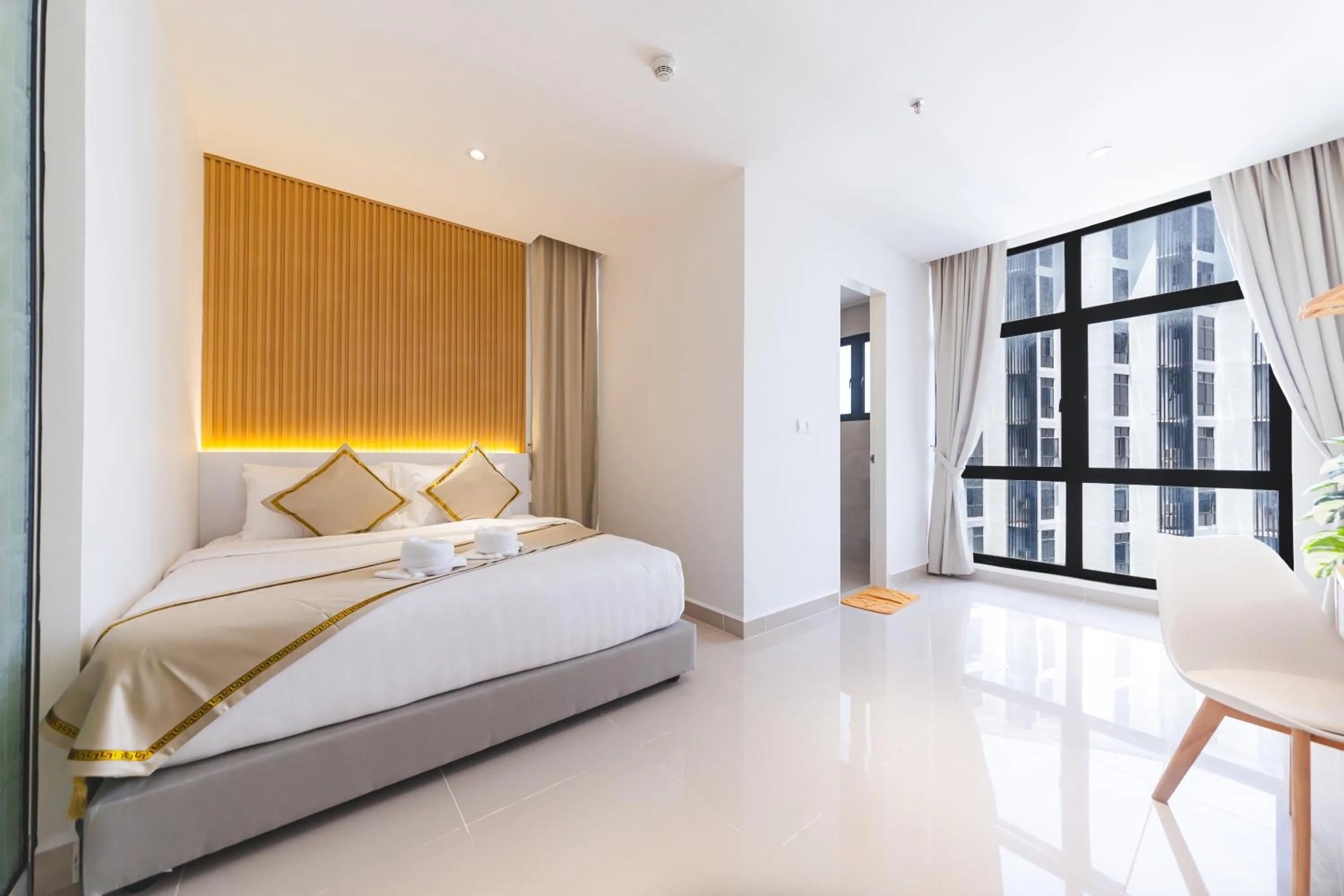 Bed in 5StarPanda Seaview Suites at The Shore Kota Kinabalu