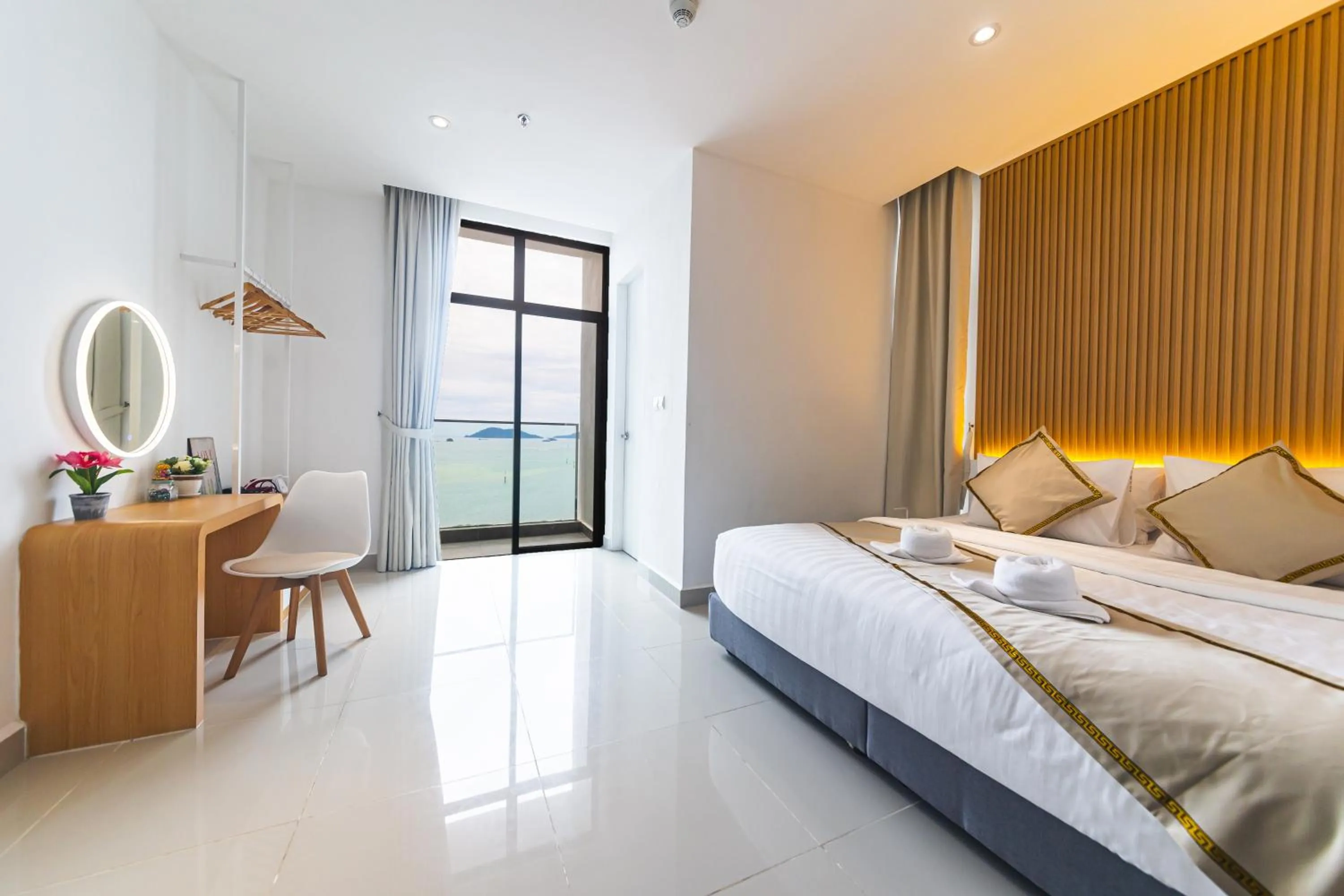 Bed in 5StarPanda Seaview Suites at The Shore Kota Kinabalu
