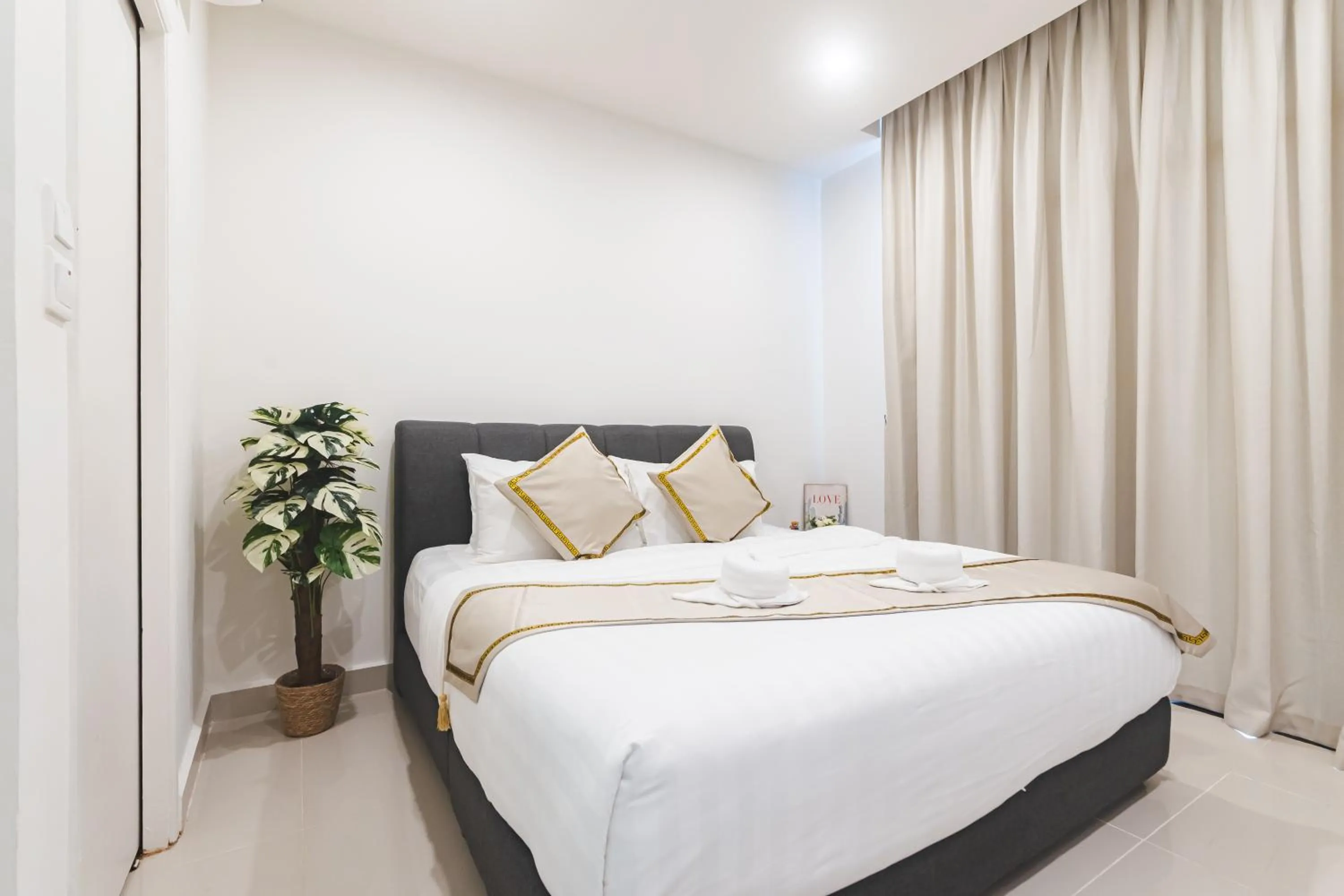 Bed in 5StarPanda Seaview Suites at The Shore Kota Kinabalu