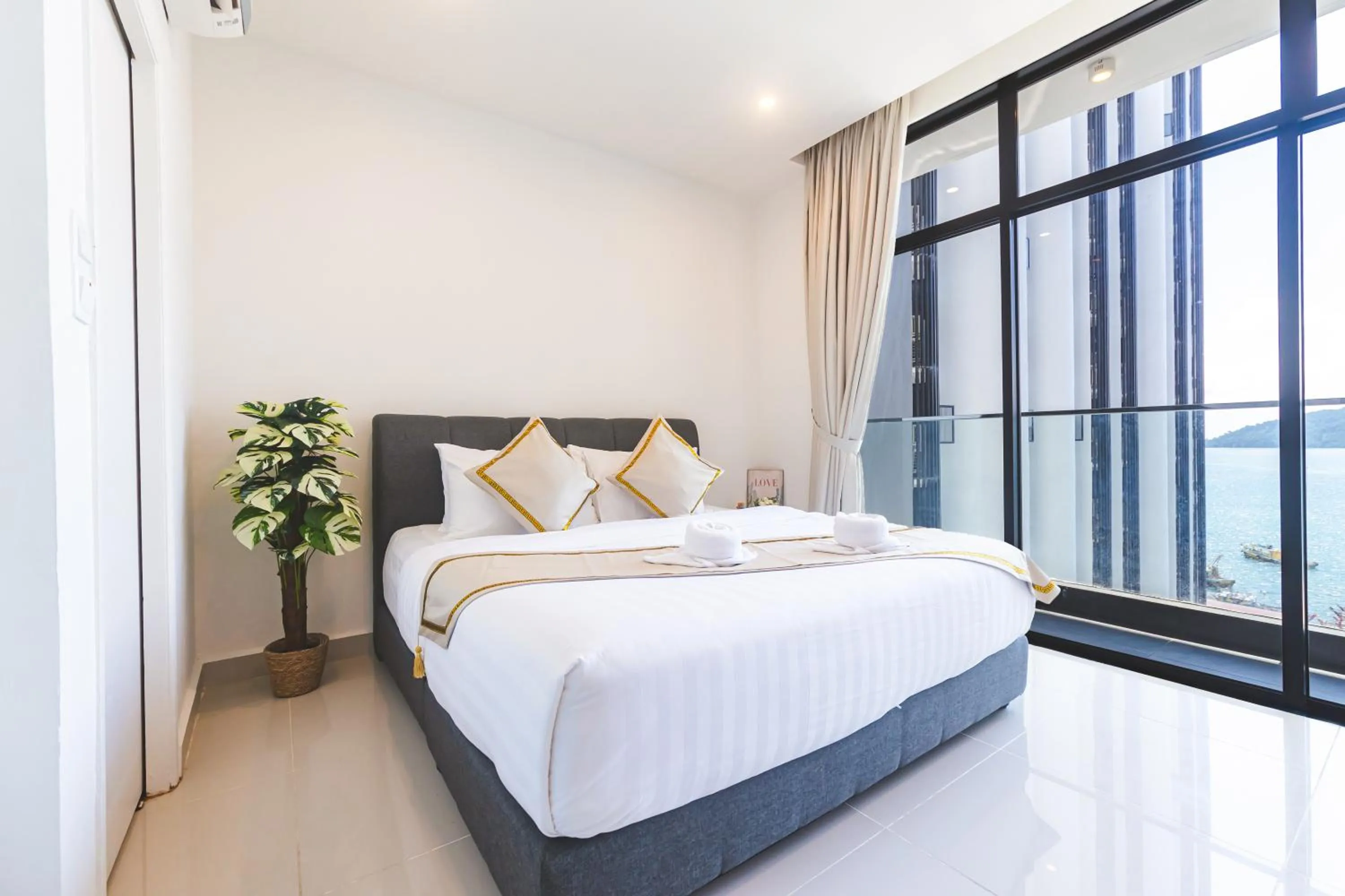 Bed in 5StarPanda Seaview Suites at The Shore Kota Kinabalu