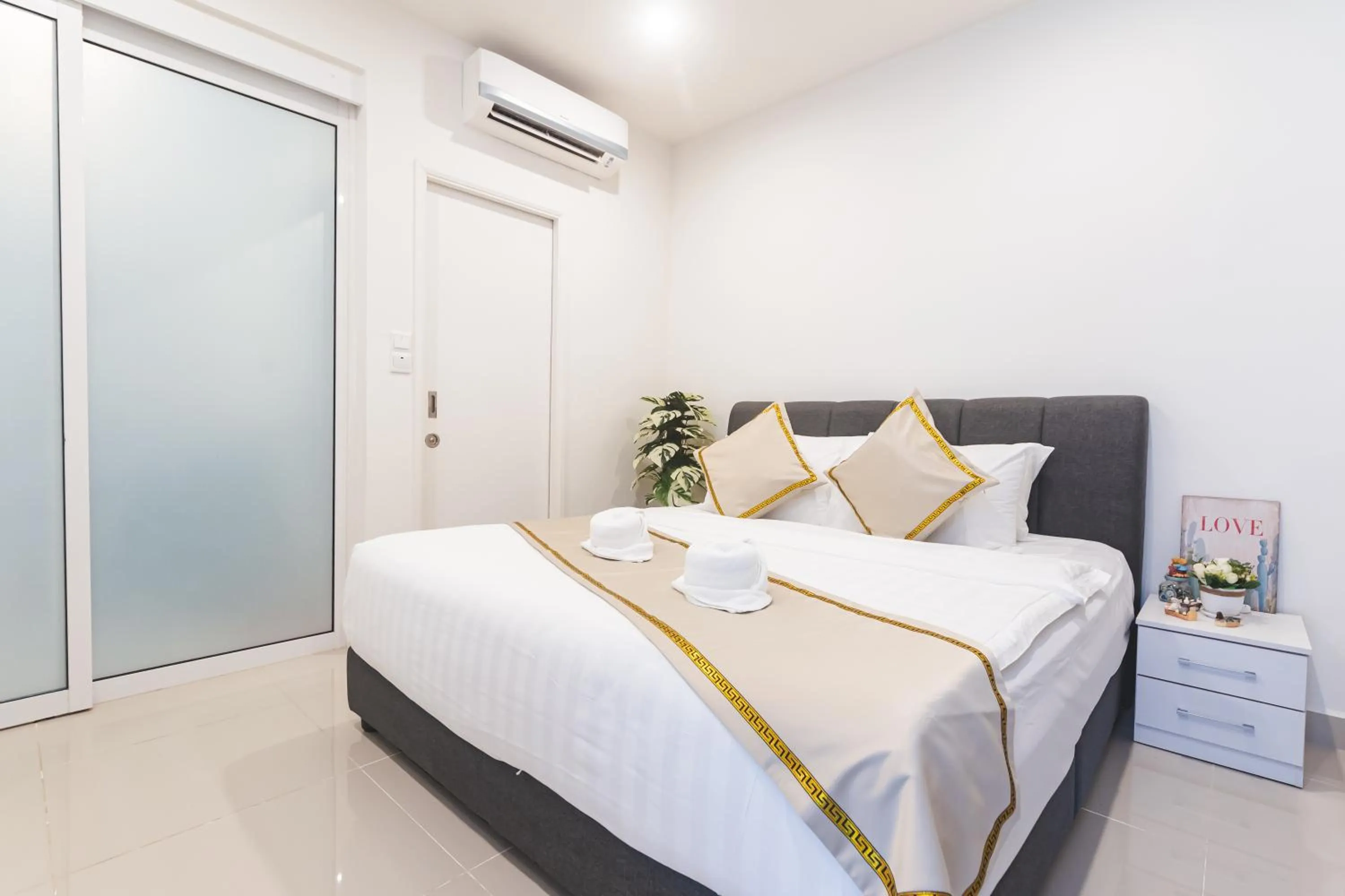 Bed in 5StarPanda Seaview Suites at The Shore Kota Kinabalu