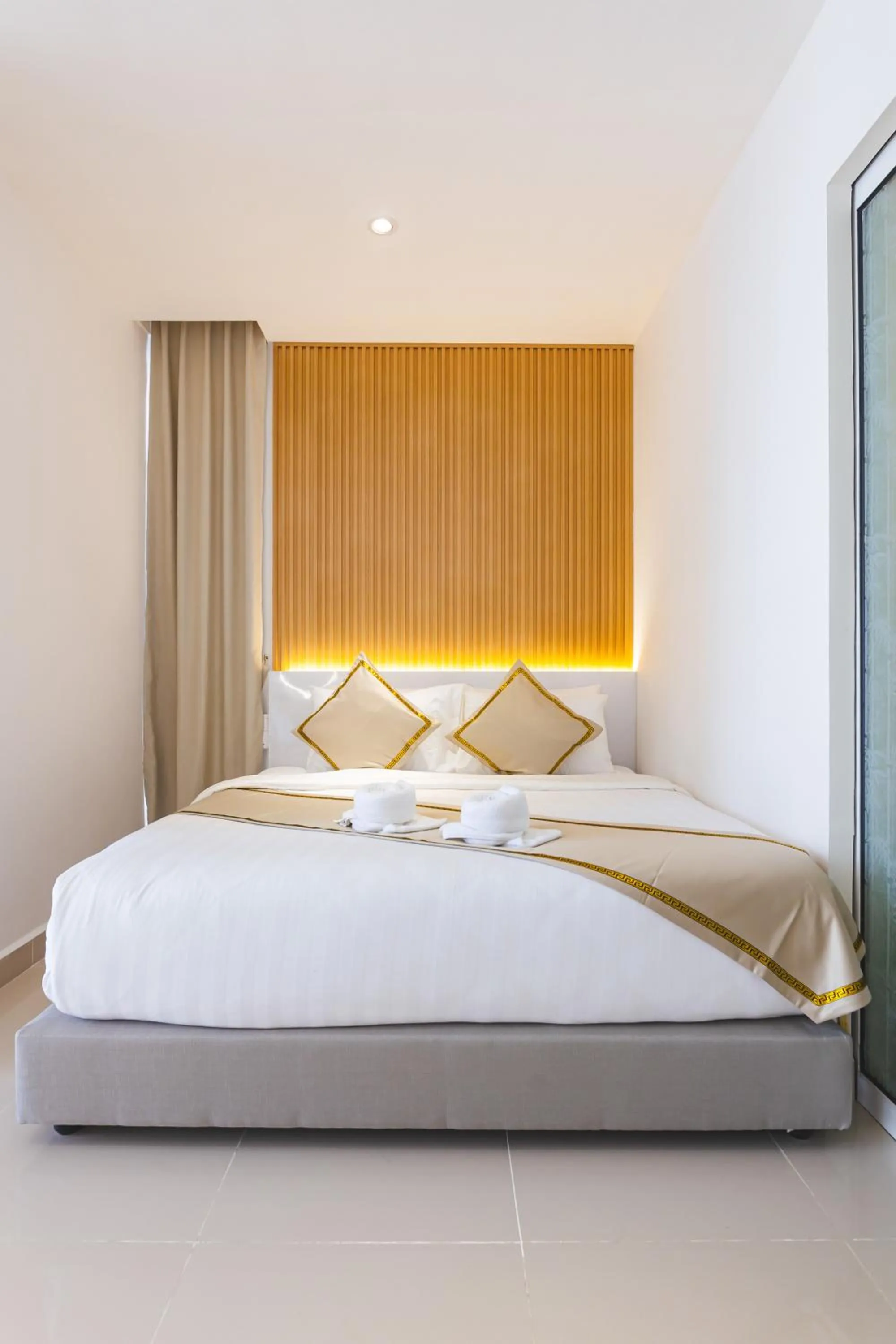 Bed in 5StarPanda Seaview Suites at The Shore Kota Kinabalu