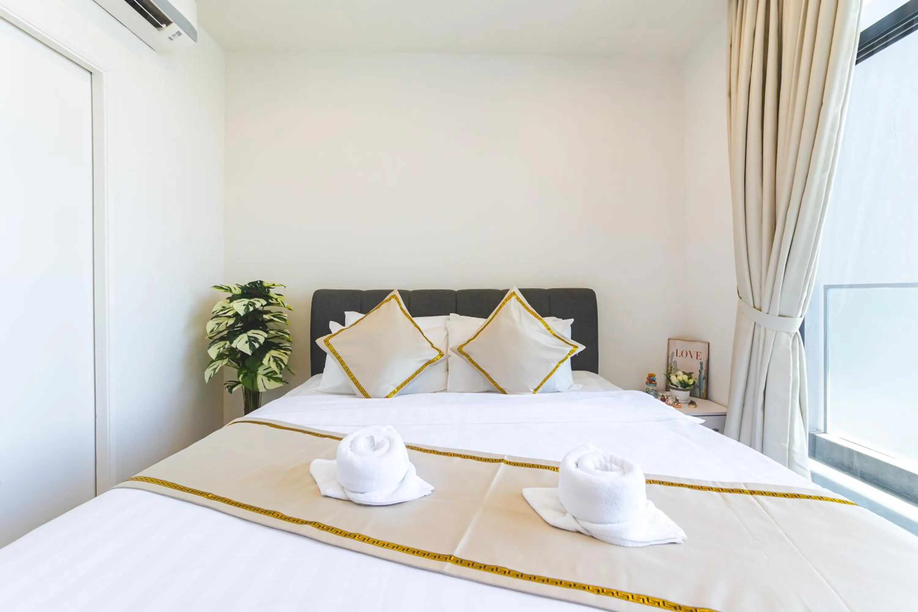 Bed in 5StarPanda Seaview Suites at The Shore Kota Kinabalu