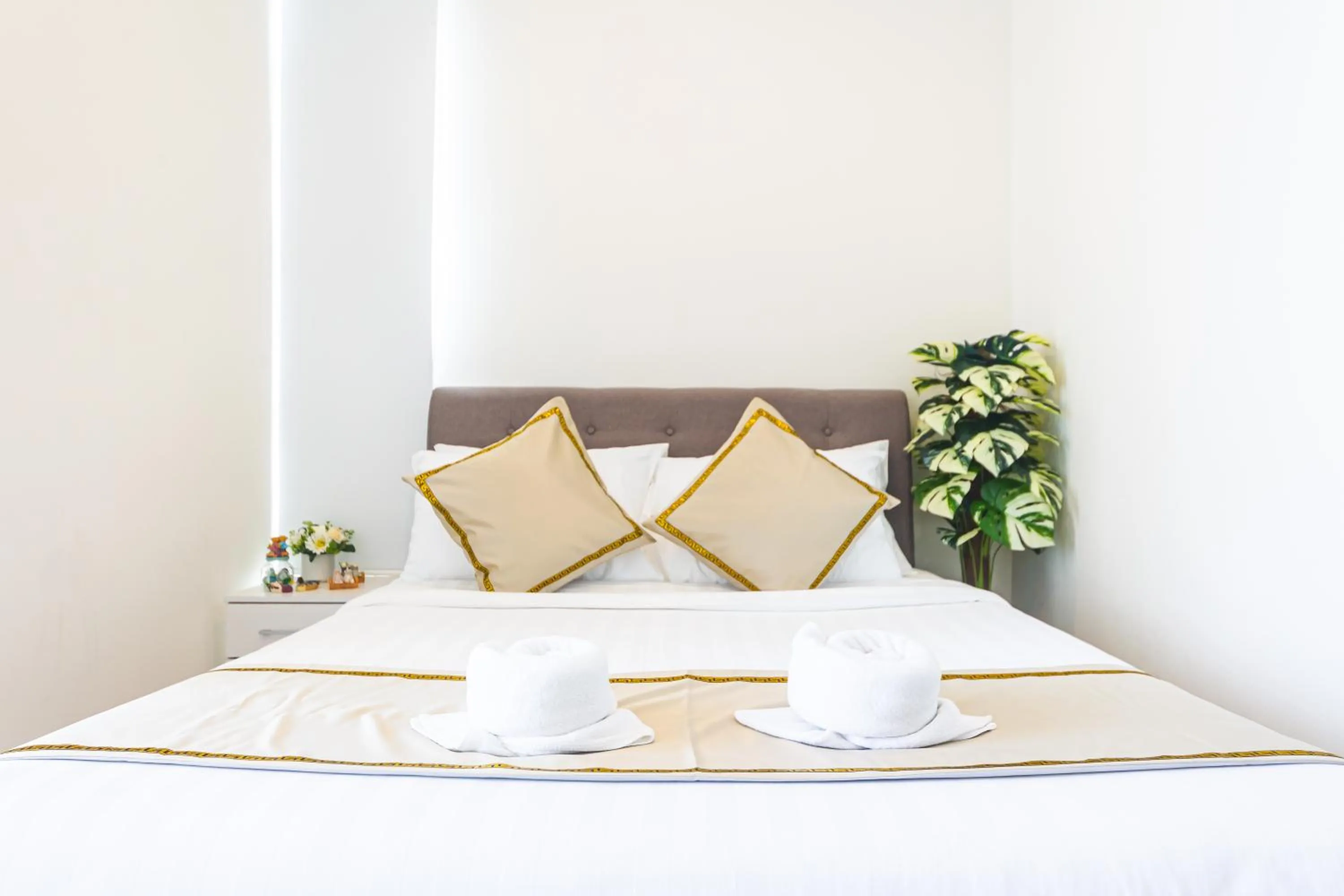 Bed in 5StarPanda Seaview Suites at The Shore Kota Kinabalu