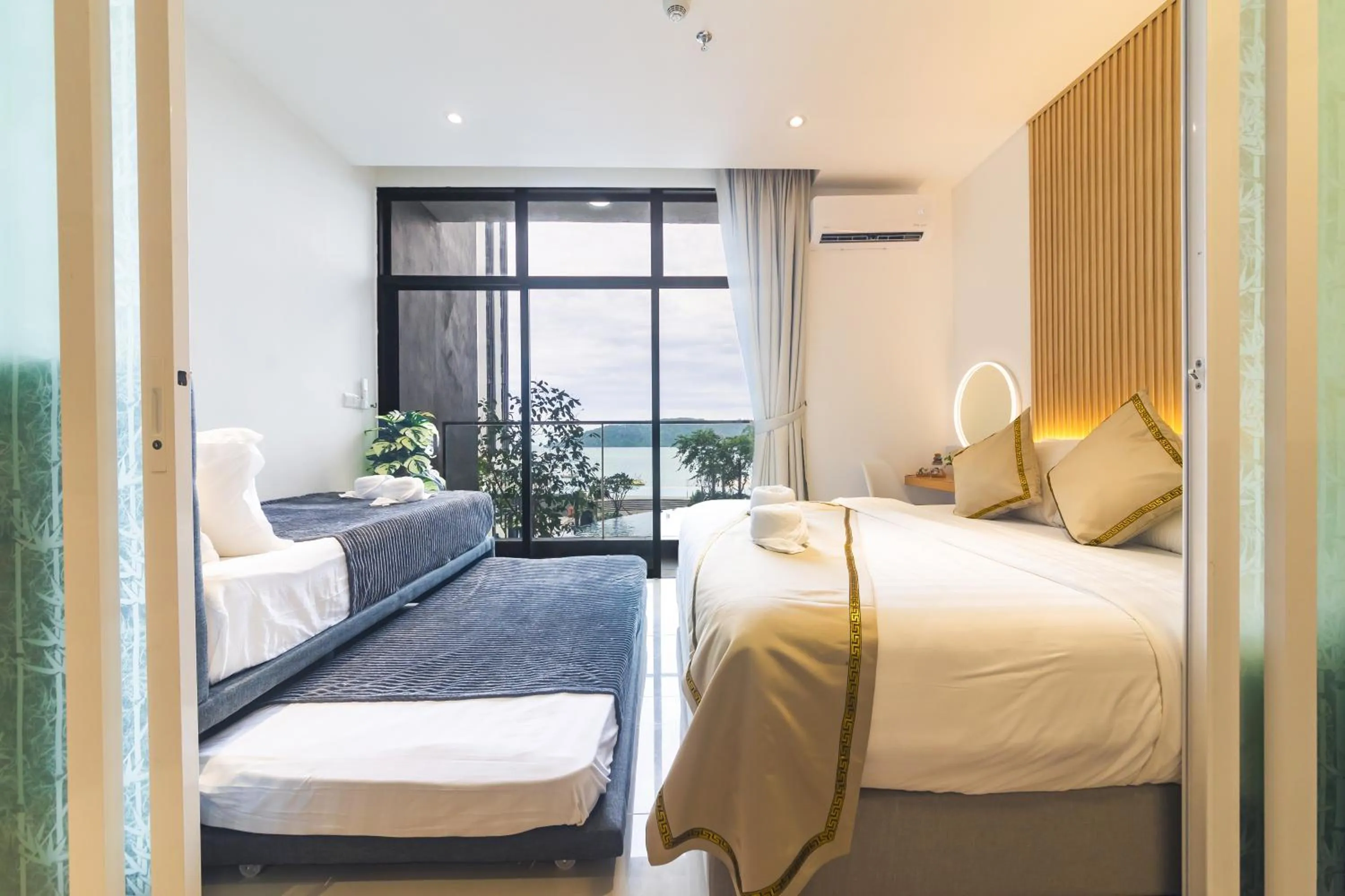 Bed in 5StarPanda Seaview Suites at The Shore Kota Kinabalu