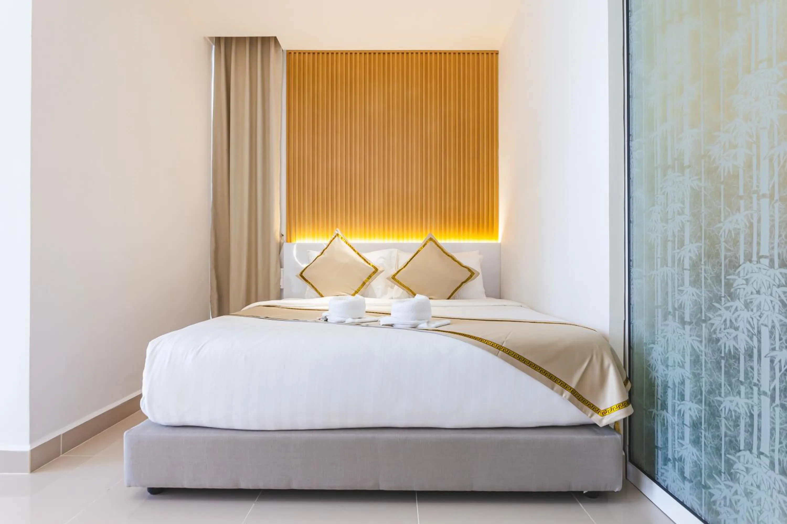 Bed in 5StarPanda Seaview Suites at The Shore Kota Kinabalu