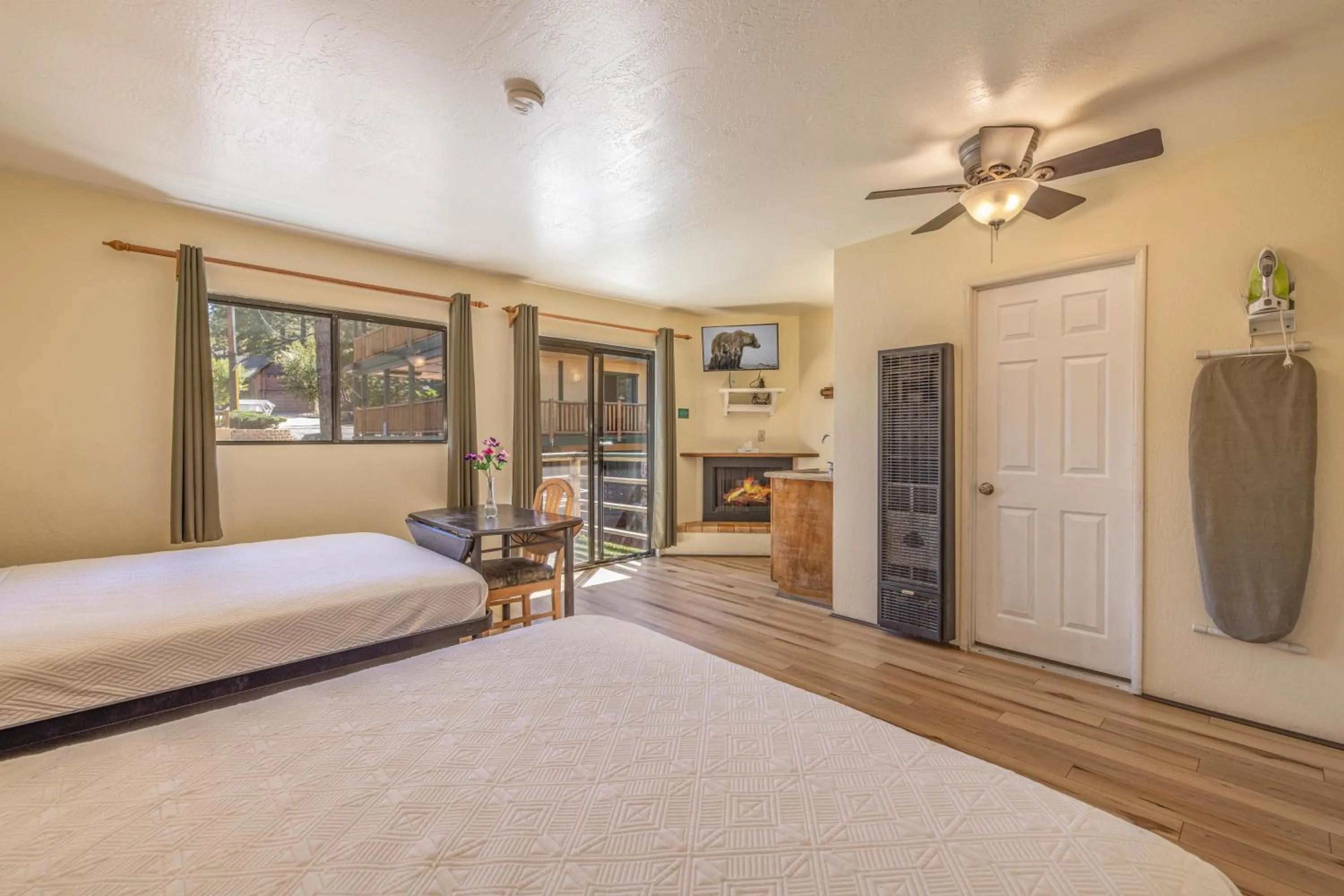 fireplace, Bed in Big Bear Lakefront Lodge