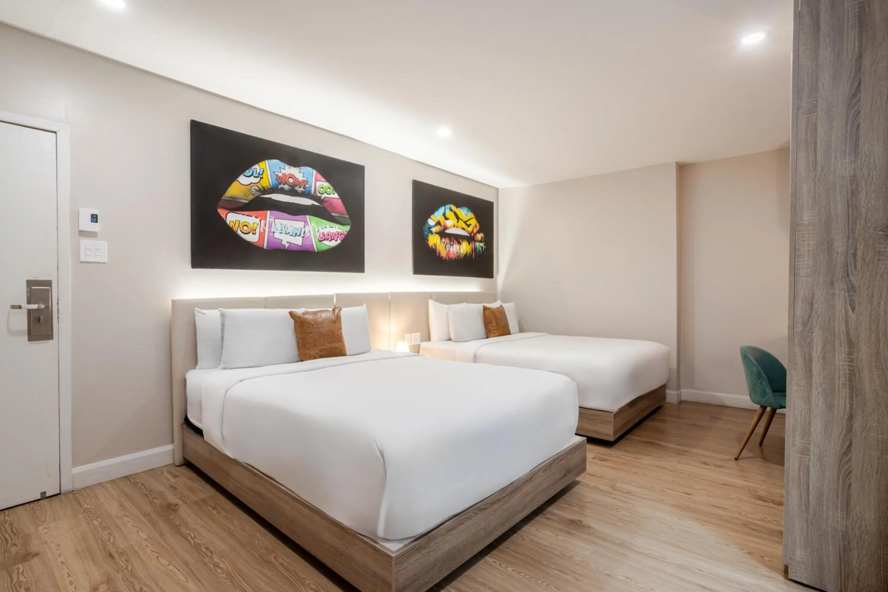 Bed in Olympia Hotel by Lodgo