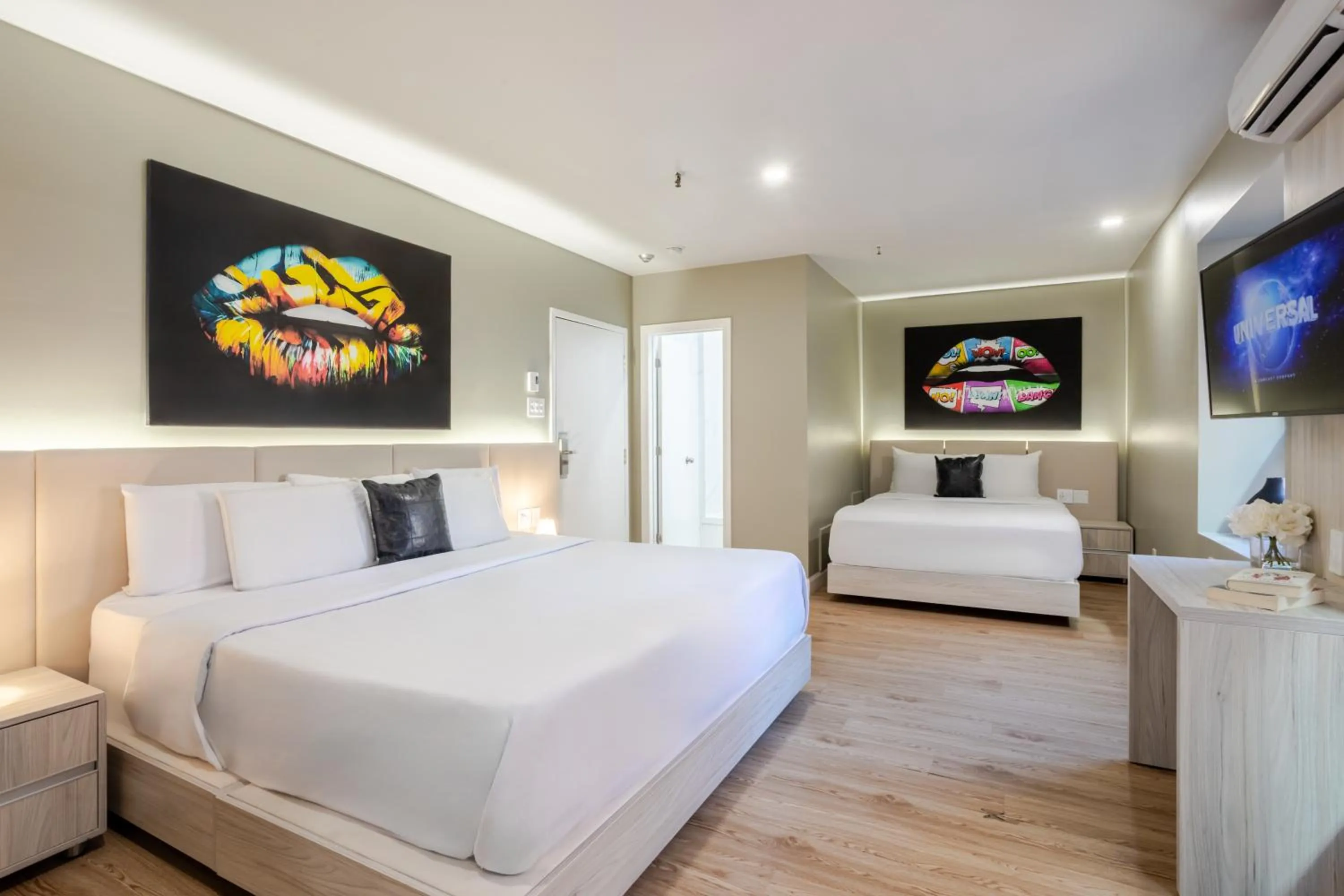 Bed in Olympia Hotel by Lodgo