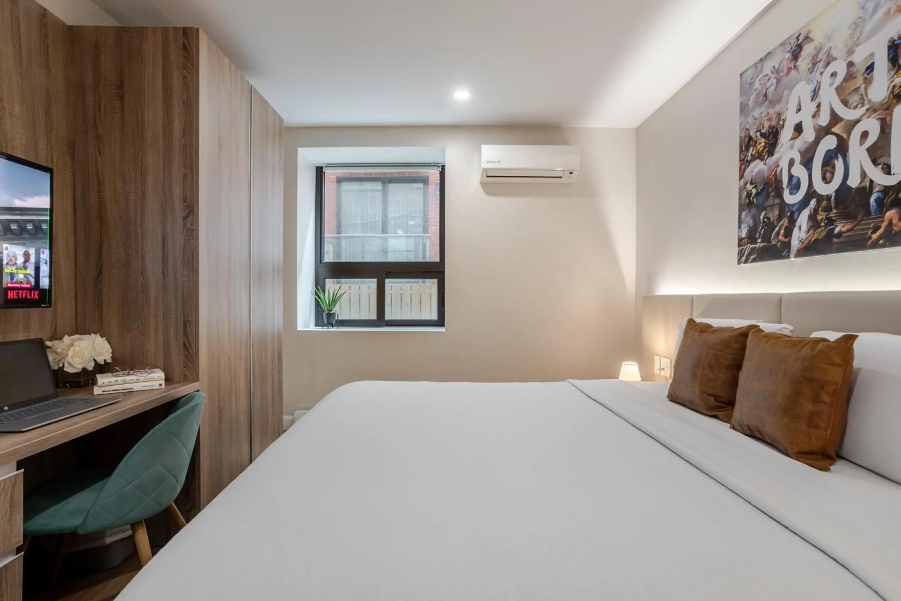 Bed in Olympia Hotel by Lodgo