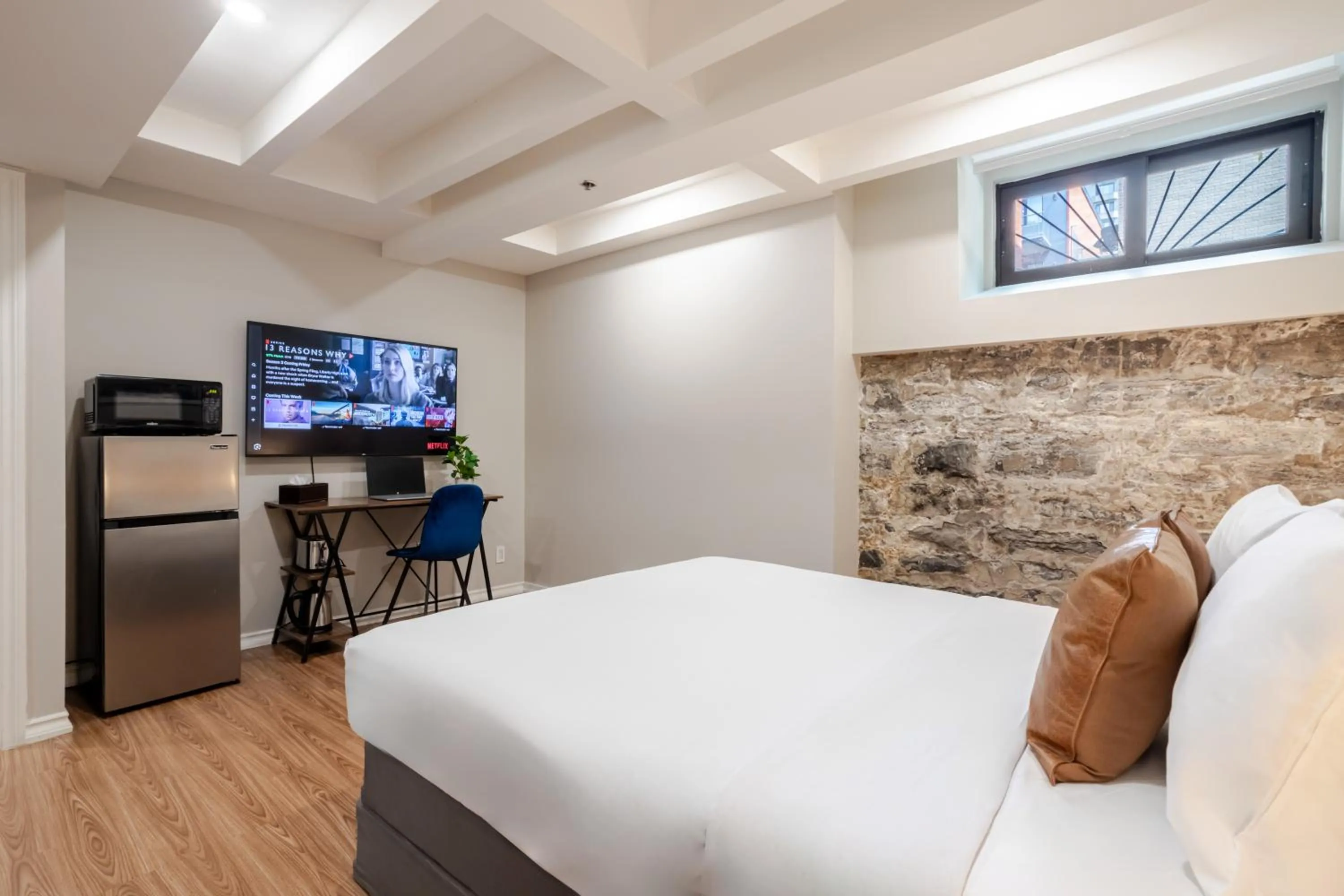 Bed in Olympia Hotel by Lodgo