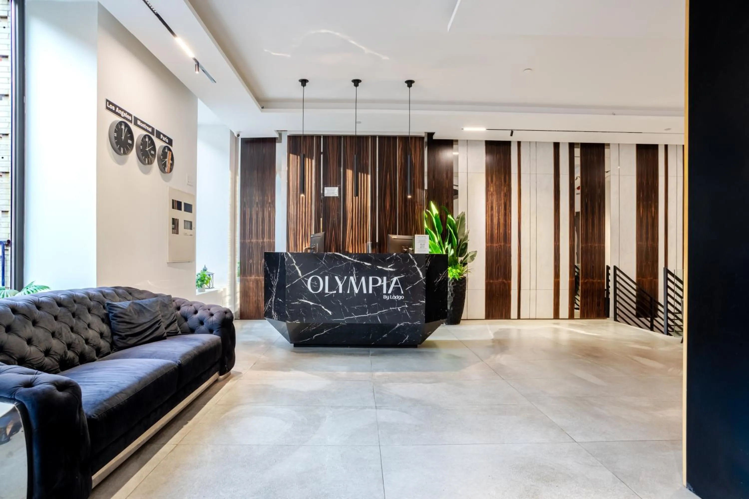 Lobby or reception in Olympia Hotel by Lodgo
