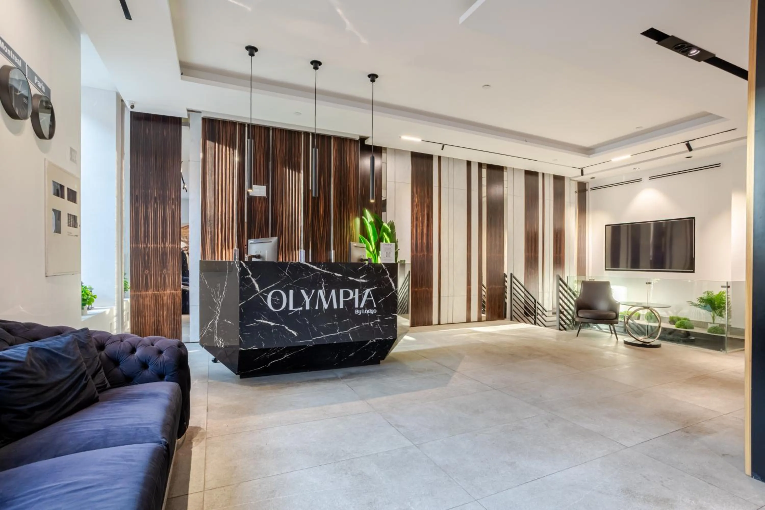 Lobby or reception in Olympia Hotel by Lodgo