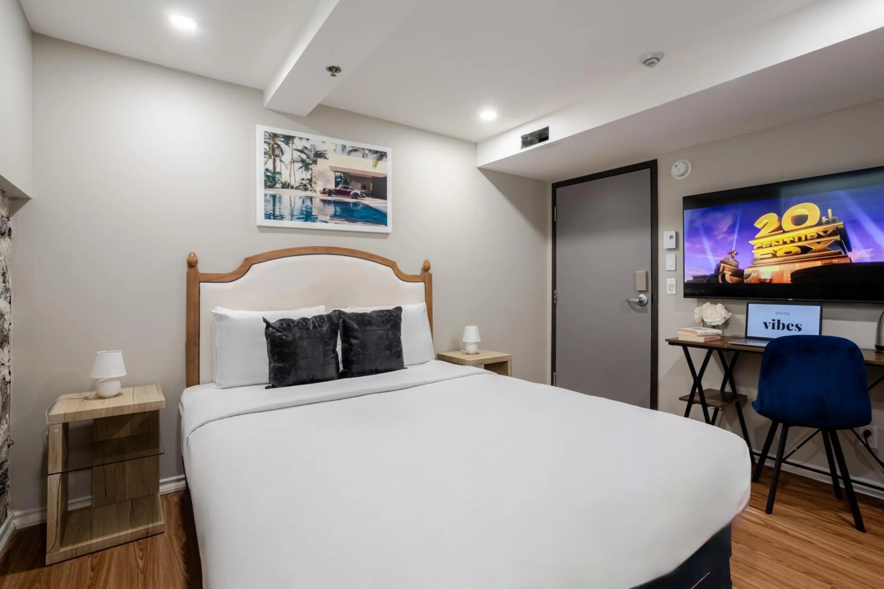 Bed in Olympia Hotel by Lodgo