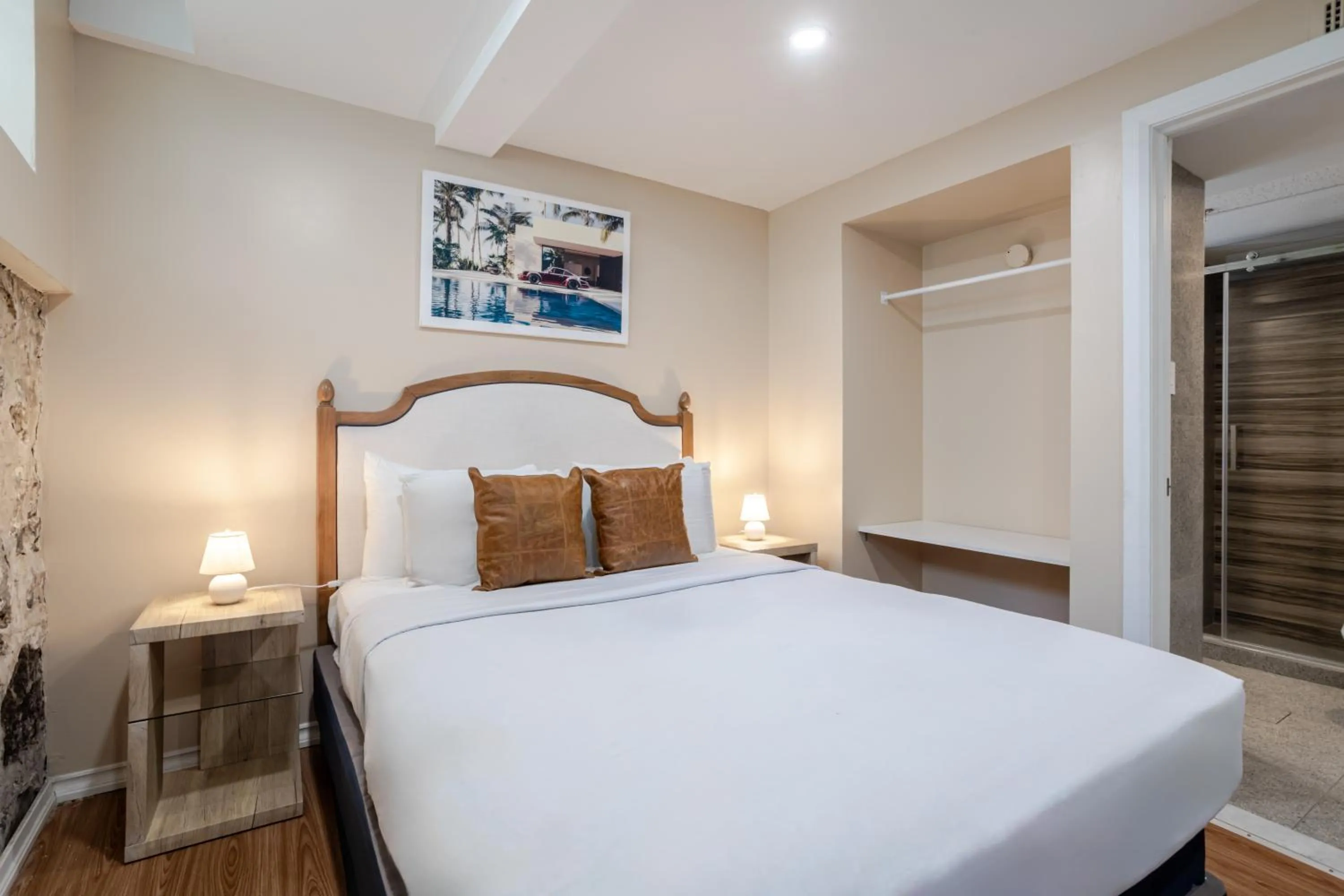 Bed in Olympia Hotel by Lodgo