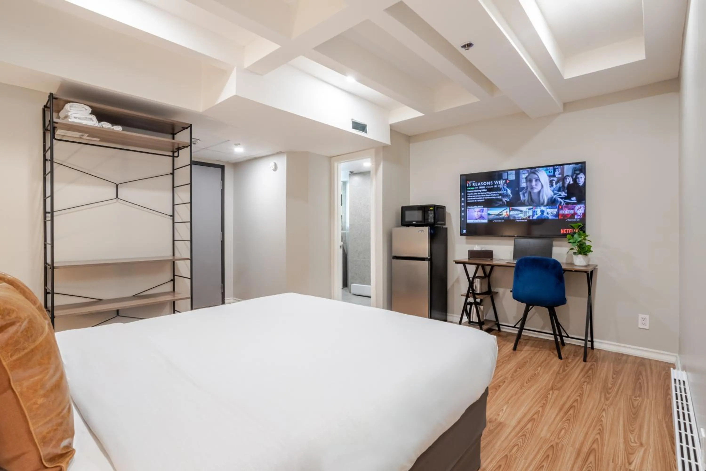 Bed in Olympia Hotel by Lodgo