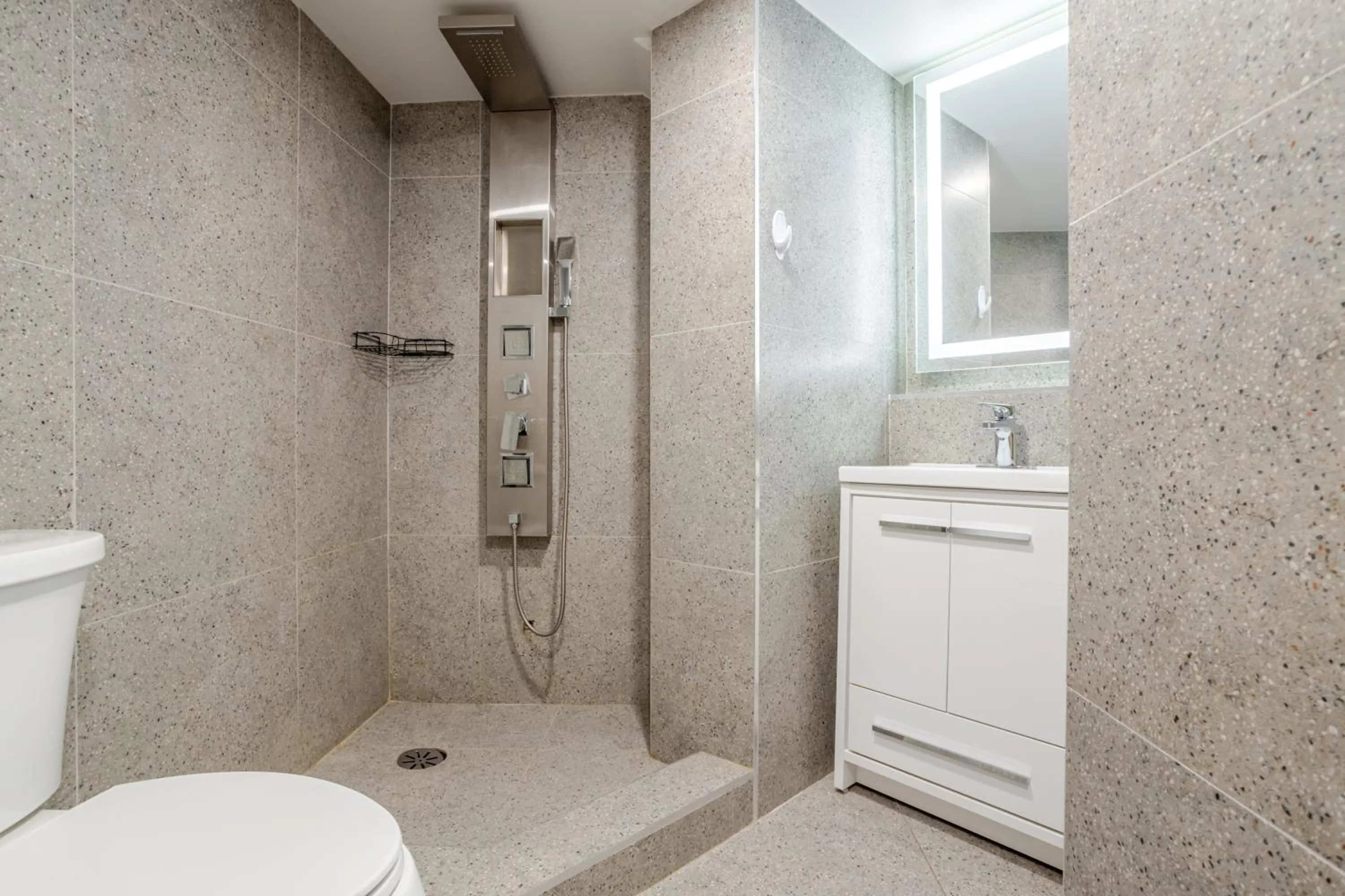 Shower in Olympia Hotel by Lodgo