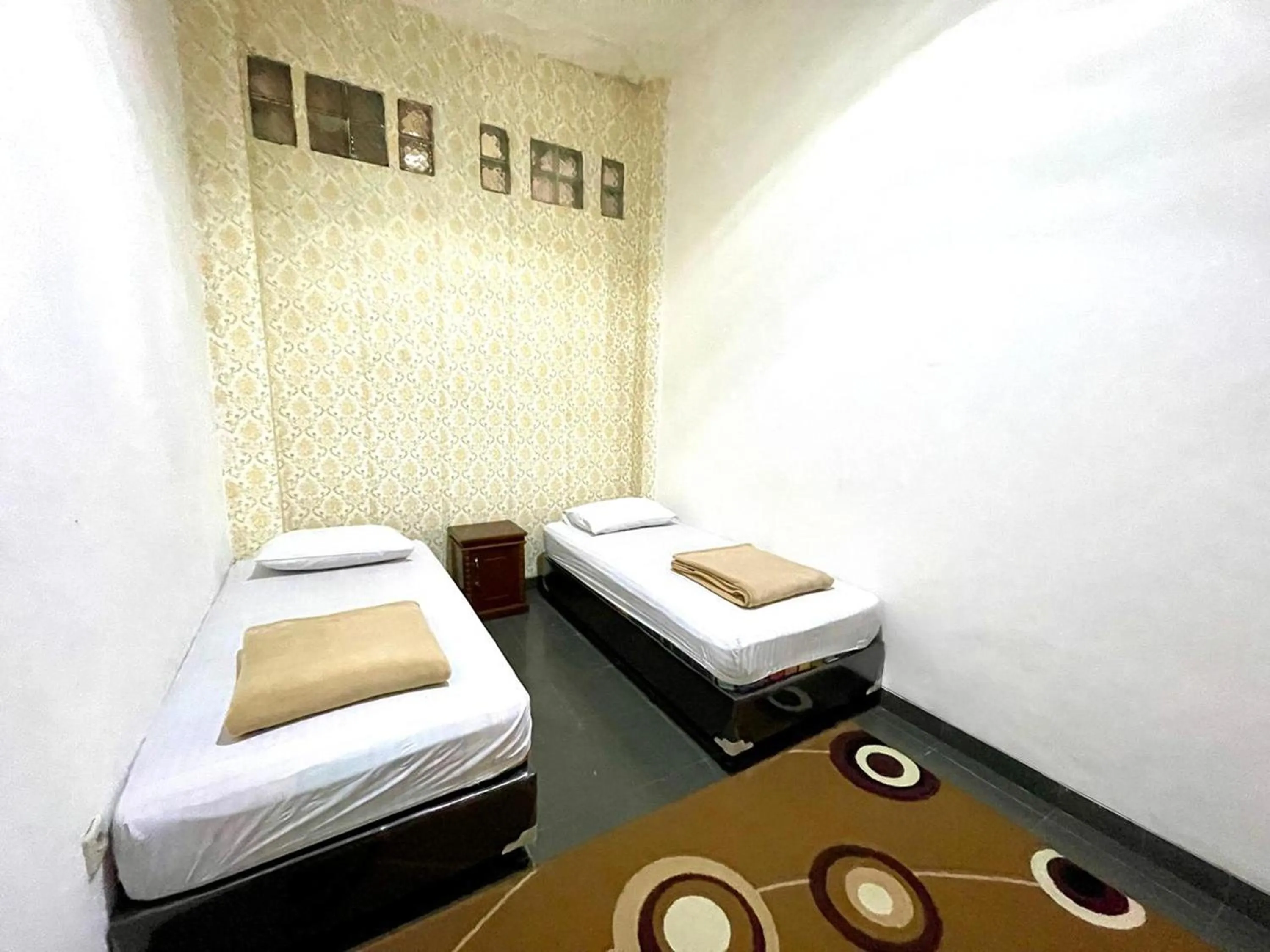 Bed in Yani Guesthouse