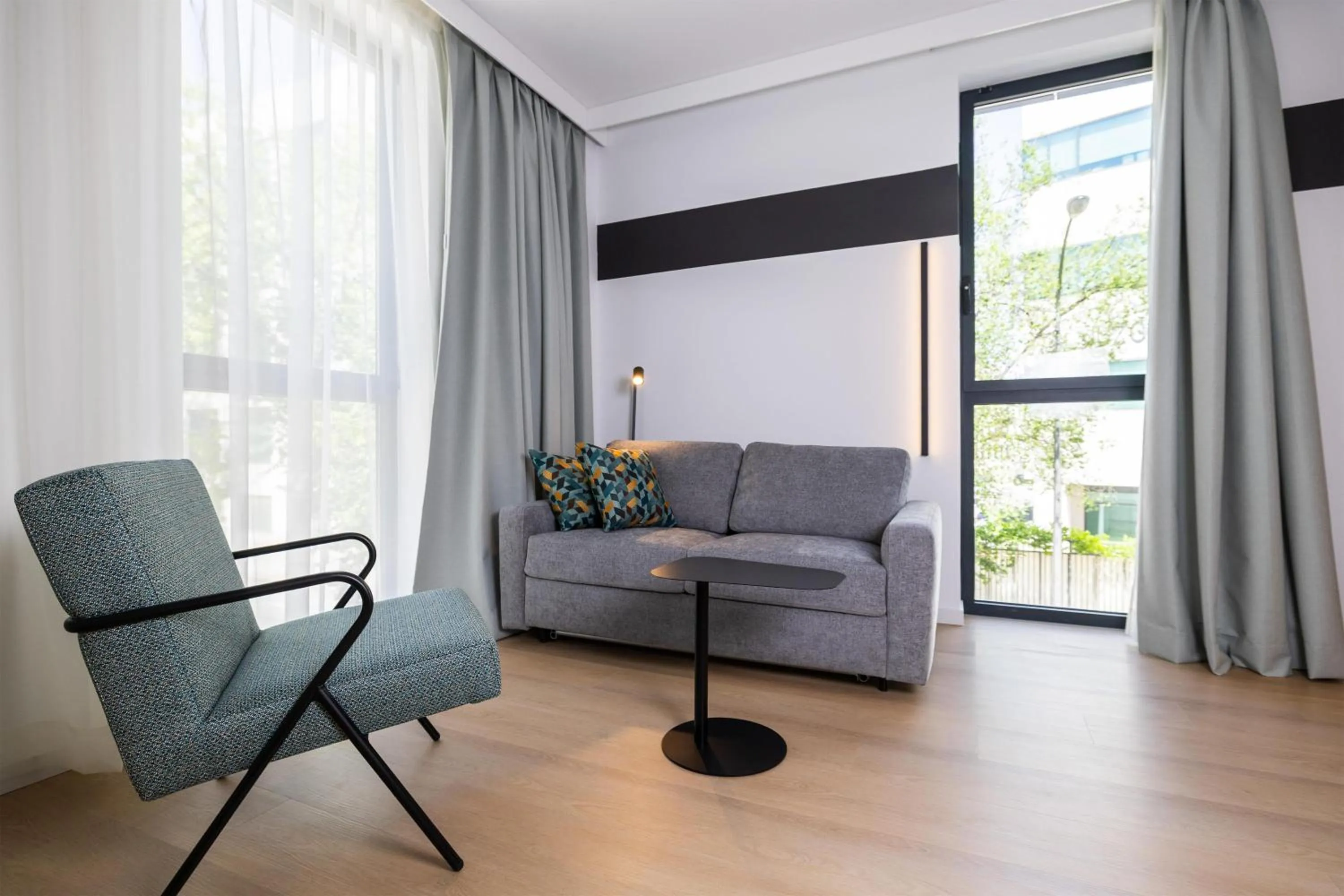 Living room in Spark By Hilton Madrid Alcala