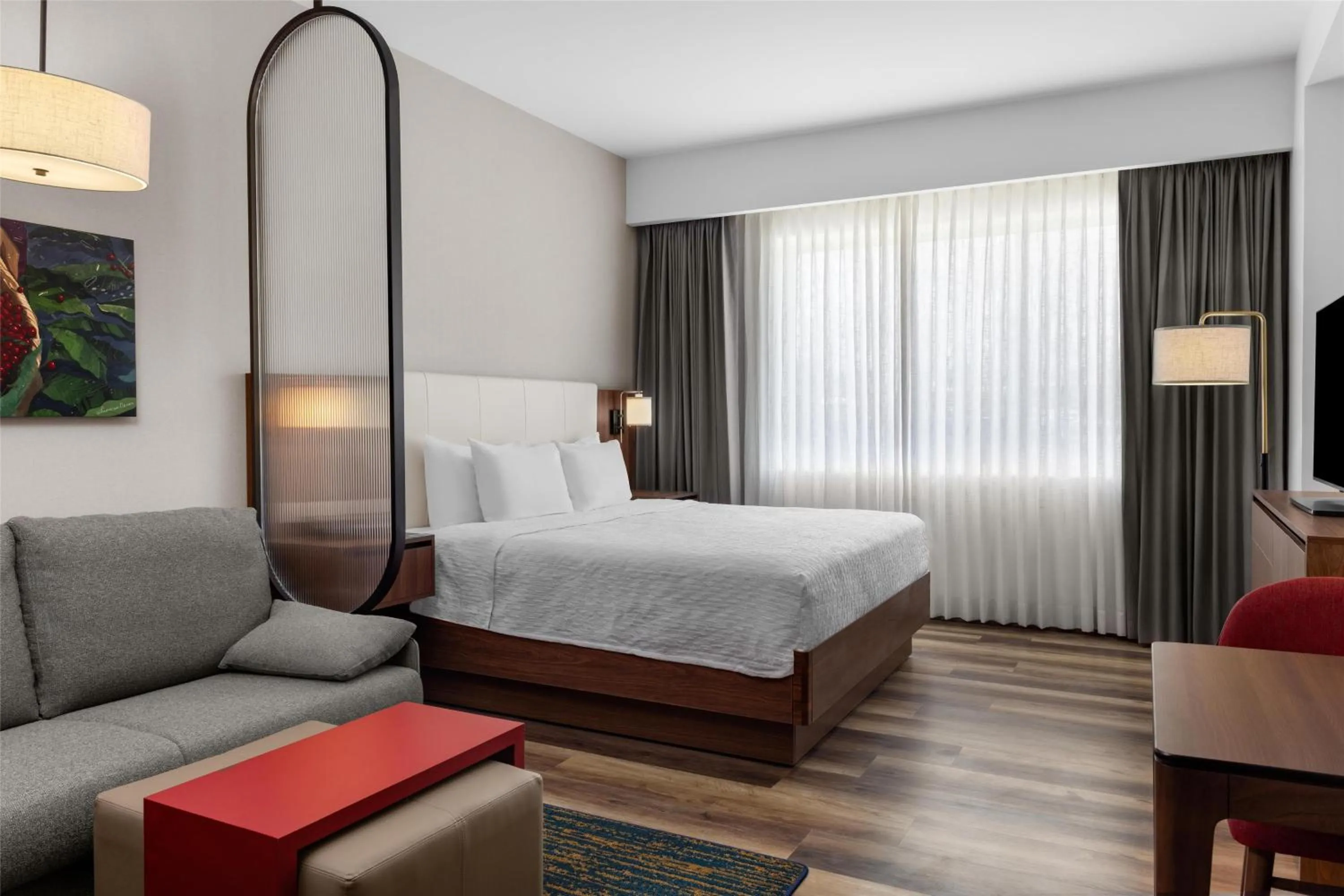 Living room, Bed in Homewood Suites By Hilton Cariari San Jose