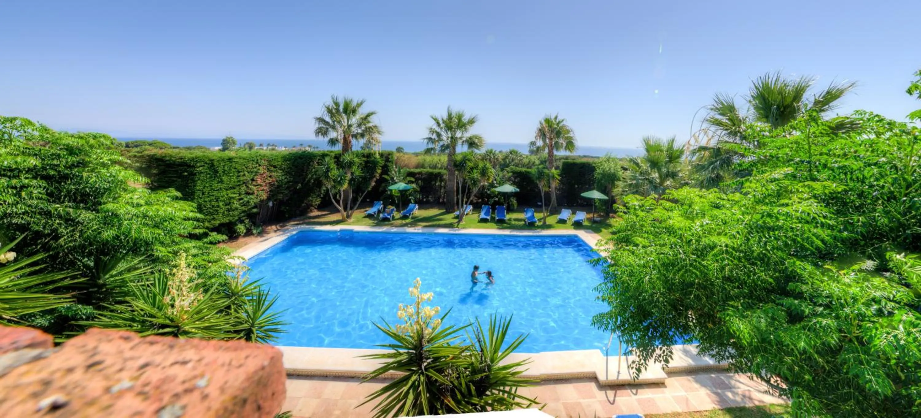 Swimming pool in Dulce Nombre Hotel - Apartamentos